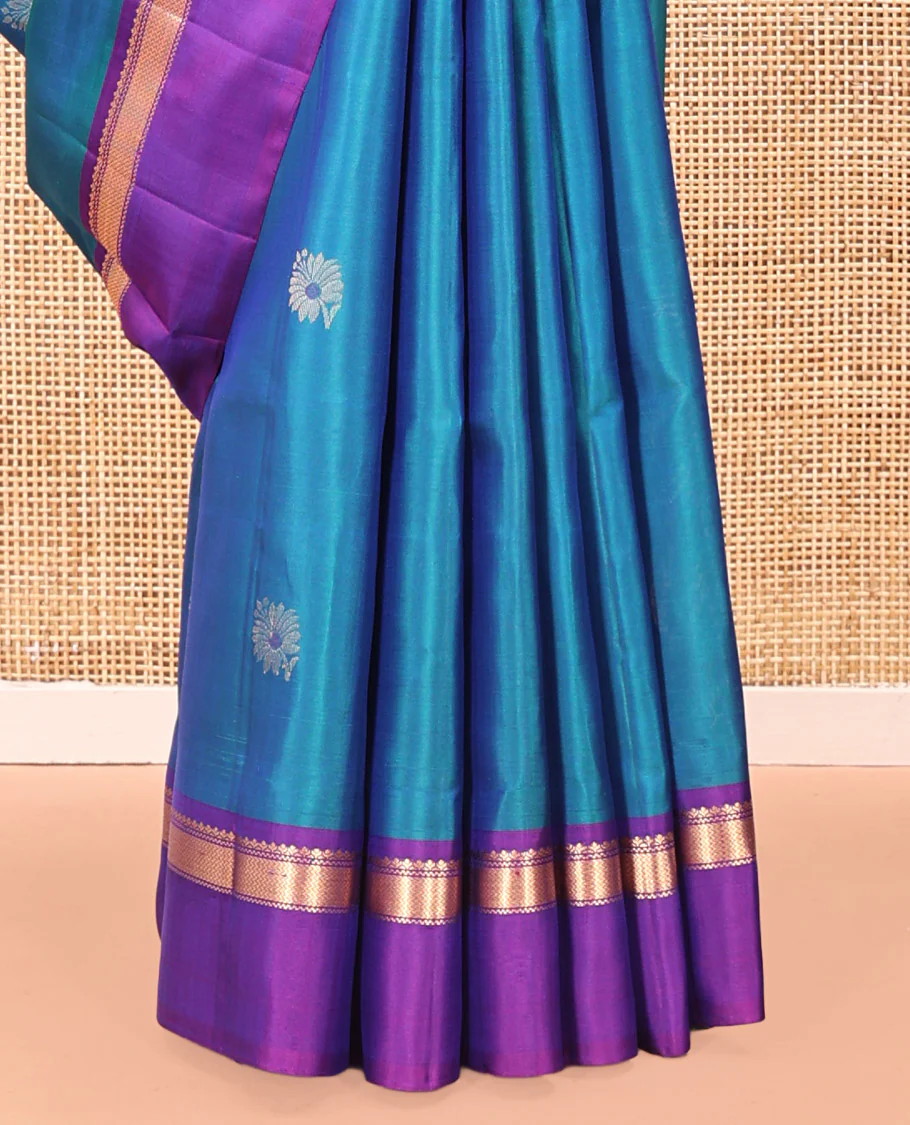 Blue Mayuri Soft Silk Saree Spotlighted with Zari Buttas All Over Its Body, Complemented by Kal Erangina Border of Vanki Designs, Diagonally Woven Pallu and Paired with a Contrast Blouse - Image 4