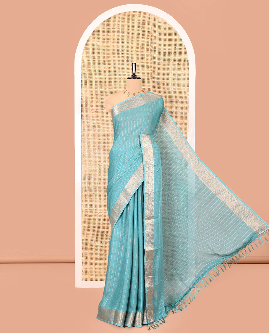 Blue Moss Chiffon Saree, Gleamed Up with Vertical Zari Stripes All Over Its Body, Highlighted by a Zari Border of Paisleys and Diamond Designs, a Self-Pallu, and Paired with a Matching Blouse