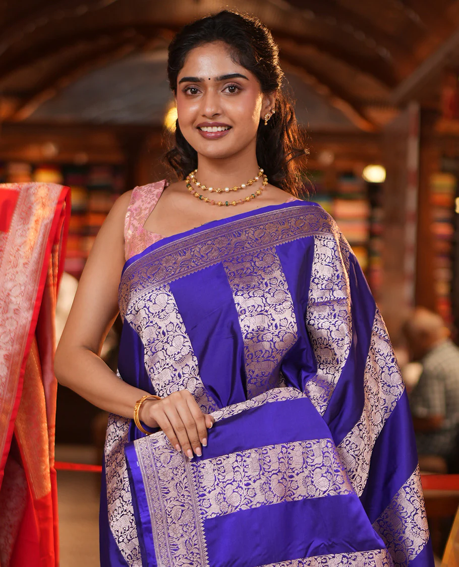 Blue Mushuru Silk Saree, Elegantly Decked Up with Vertically Woven Flora-Fauna Zari Designs On Its Body, Highlighted by Zari Border of Peacock and Deer Motifs, Grand Pallu, and Paired with a Plain Blouse - Image 2