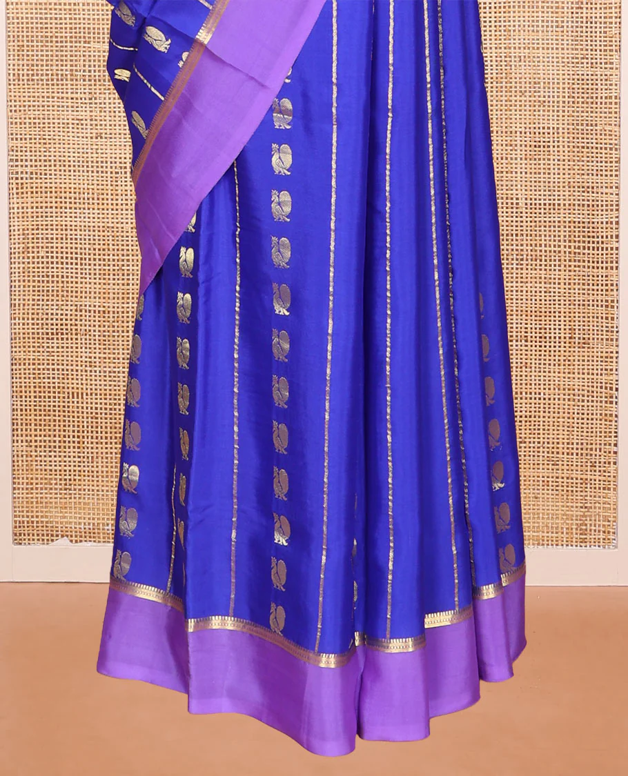 Blue Mysore Silk Saree, Gracefully Decked Up with Peacock Buttas and Stripes Across Its Body, Complemented by Contrast Border, Pallu Steeped with Traditional Zari Designs, and Paired with a Contrast Blouse - Image 4