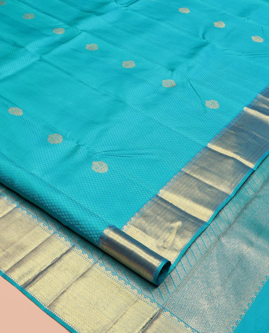 Blue Parampara Silk Saree, Adorned with Zari Buttas and Embossed Texture On Its Body, Highlighted by Zari Border of Thazampoo Rekku, Muthu, and Vanki Designs, Pallu Features Vanki Designs and Paired with a Matching Blouse - Image 2