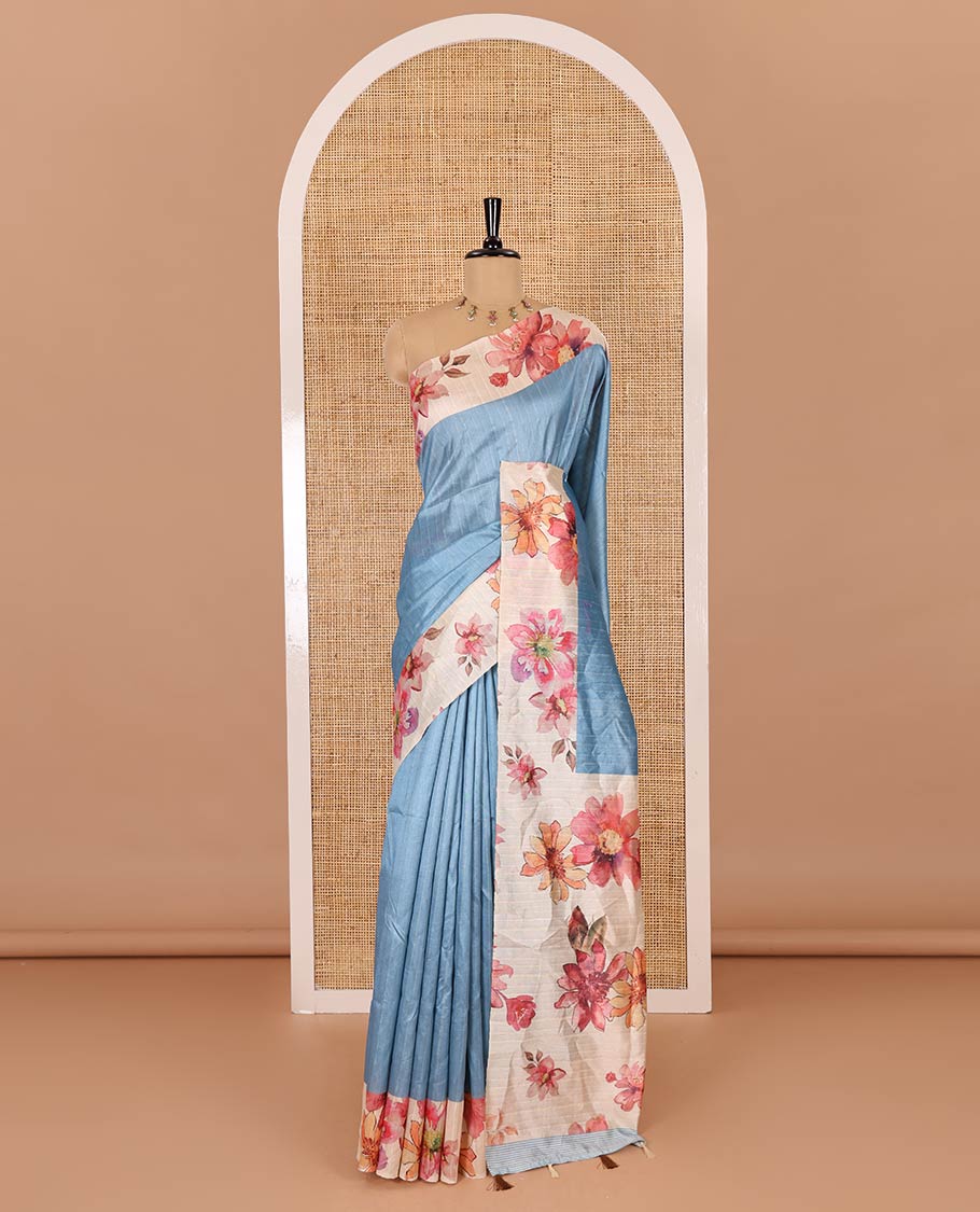 Blue plain fancy tussar digital printed saree, contrast floral digital printed border, floral printed pallu, and a floral printed blouse - Image 2