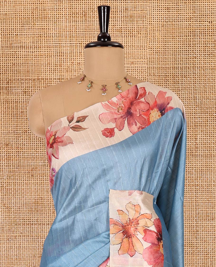 Blue plain fancy tussar digital printed saree, contrast floral digital printed border, floral printed pallu, and a floral printed blouse - Image 3