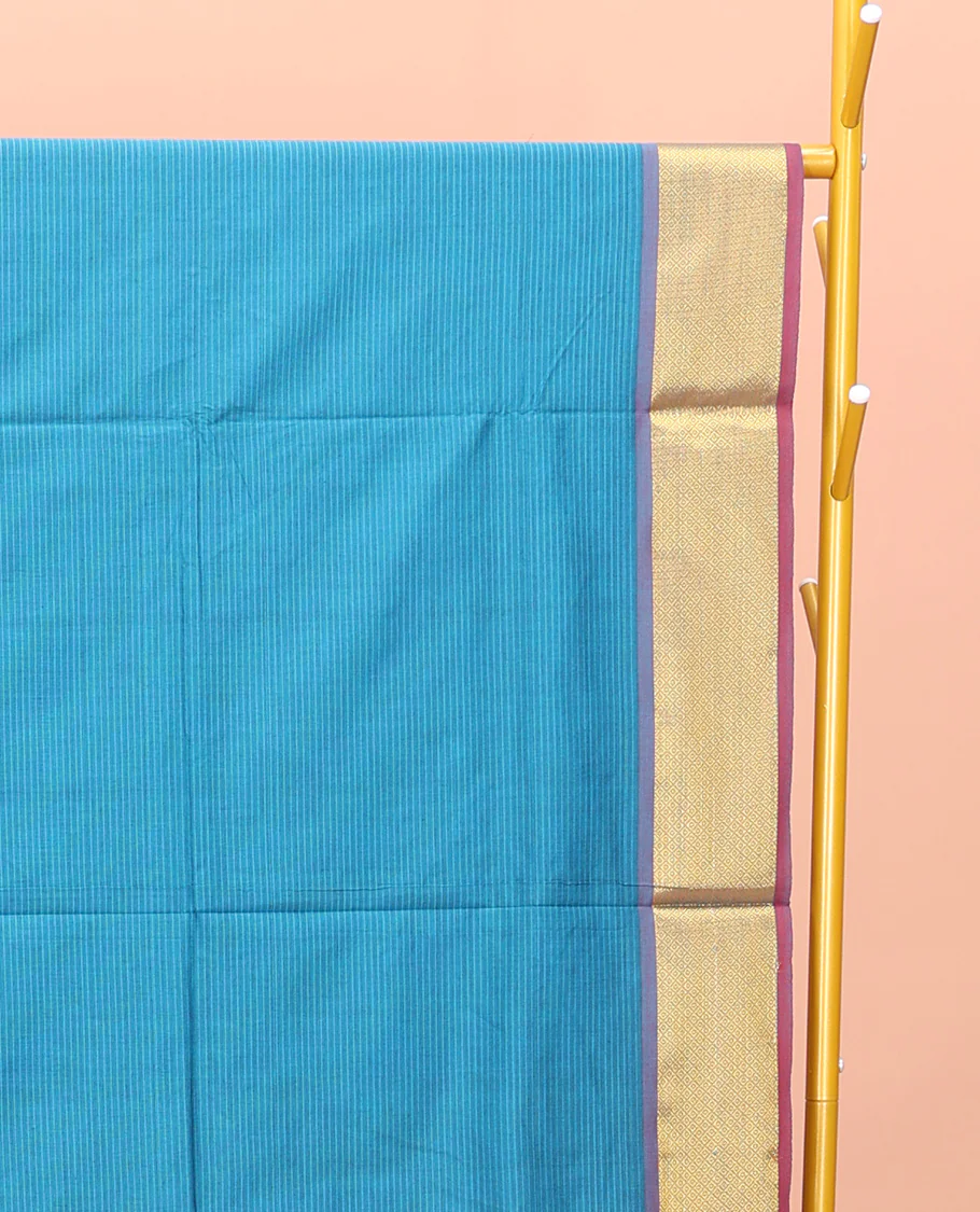 Blue Poly Cotton Saree, Sparsely Threaded with Stripes on Its Body, Complemented by Contrast Peacock-Eyed Border, Striped Pallu, and Paired with a Contrast Blouse - Image 2