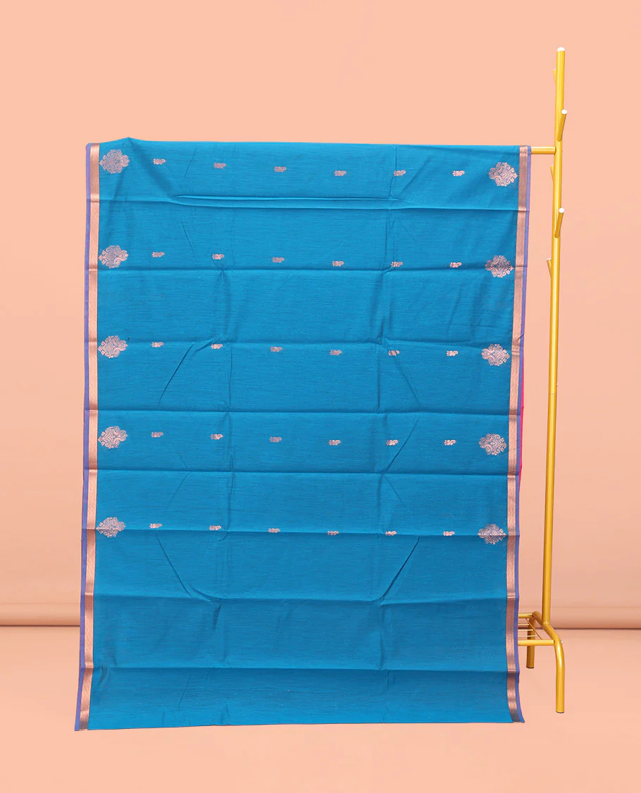 Blue Semi-Silk Cotton Saree, Enthralled with Zari Buttas All Over Its Body, a Subtle Zari Piping Border, Complemented by Contrast Pallu of Zari Butta Enclosed Checked Design, and Paired with a Contrast Blouse