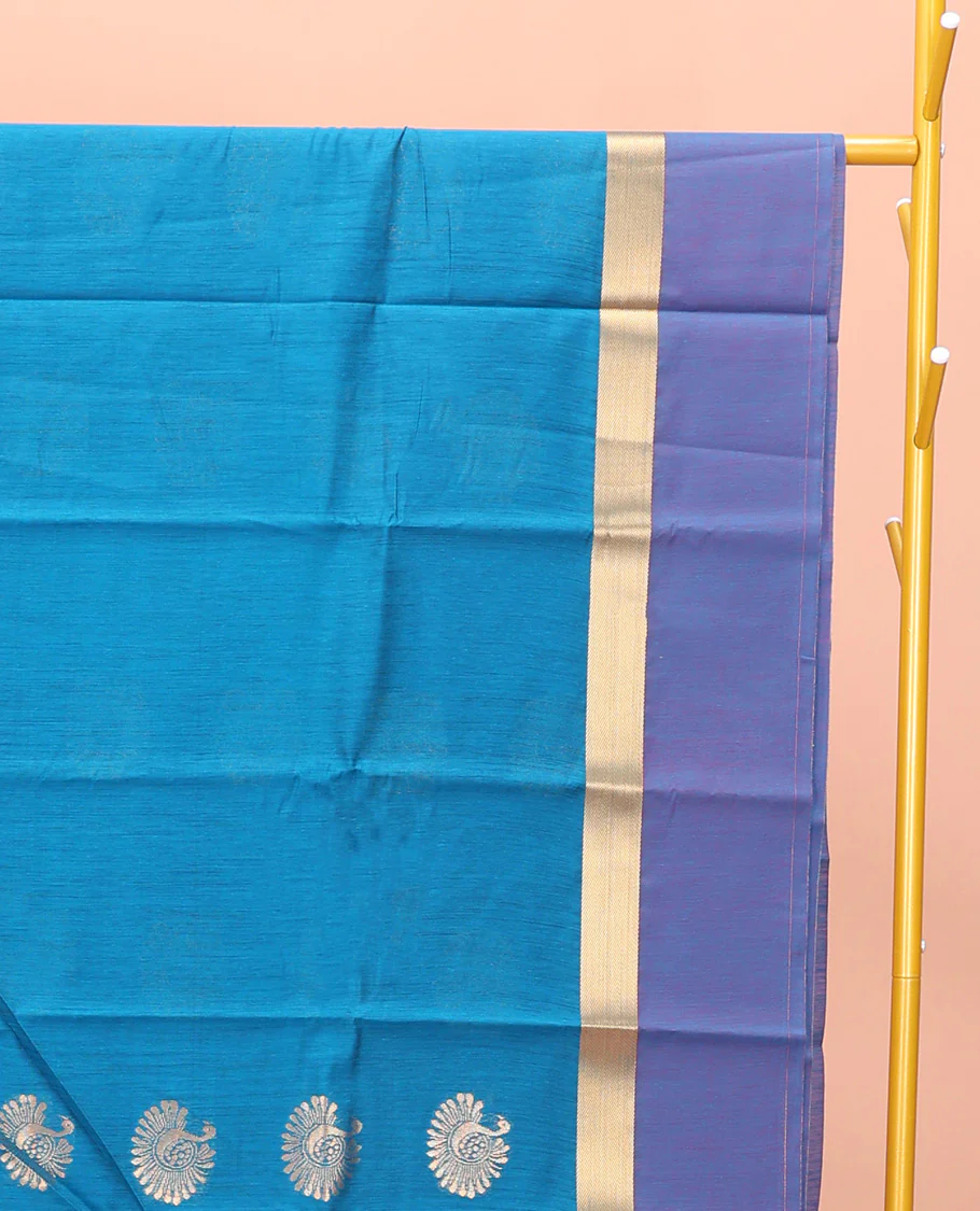 Blue Semi-Silk Cotton Saree, Gracefully Embellished with Bird Zari Buttas on Its Body, Complemented by Contrast Border of Peacock Buttas, Pallu Features Peacock Designs, and Paired with a Matching Blouse - Image 2