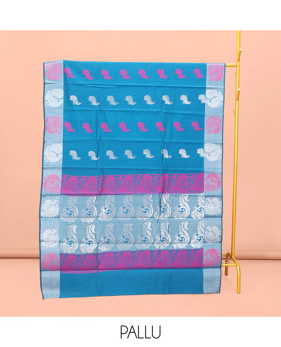 Blue Semi-Silk Cotton Saree, Uniquely Detailed with Peacock Buttas All Over Its Body, Highlighted by a Zari Border of Peacock Designs, Pallu Steeped with Peacock Zari Motifs, and Paired with a Matching Blouse - Image 3