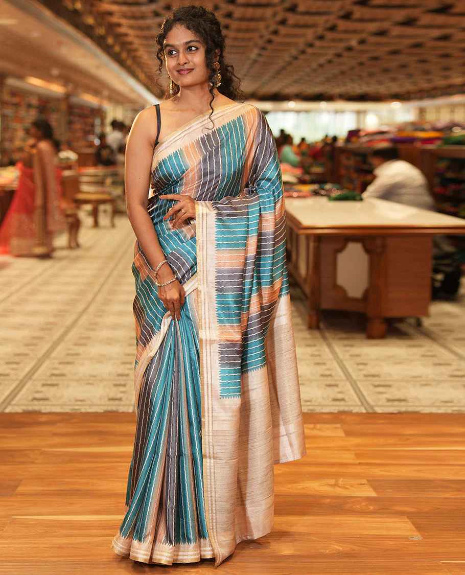 Blue Semi-Tussar Saree Colorfully Printed with Zig-Zag Stripes, Subtly Woven with a Resham Thread Temple Border, Featuring a Heathered Pallu, Paired with a Contrast Striped Blouse - Image 2