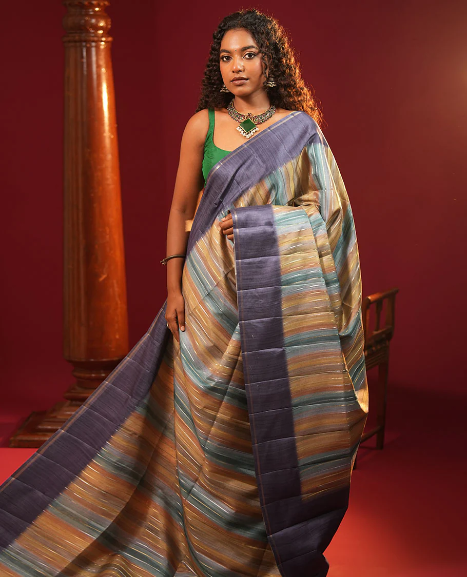 Blue Striped Semi-Tussar Silk Saree, Adorned with Vertical Zari Stripes on Its Body, Subtle Zari Border, a Subtle Pallu, and Paired with a Contrast Striped Blouse