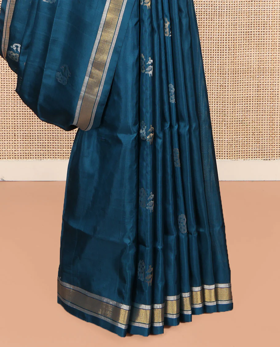 Blue Uppada Silk Saree, Enriched with Peacock Buttas All Over Its Body, Highlighted by a Zari Border, Pallu of Floral Vine Designs, and Paired with a Matching Blouse - Image 4