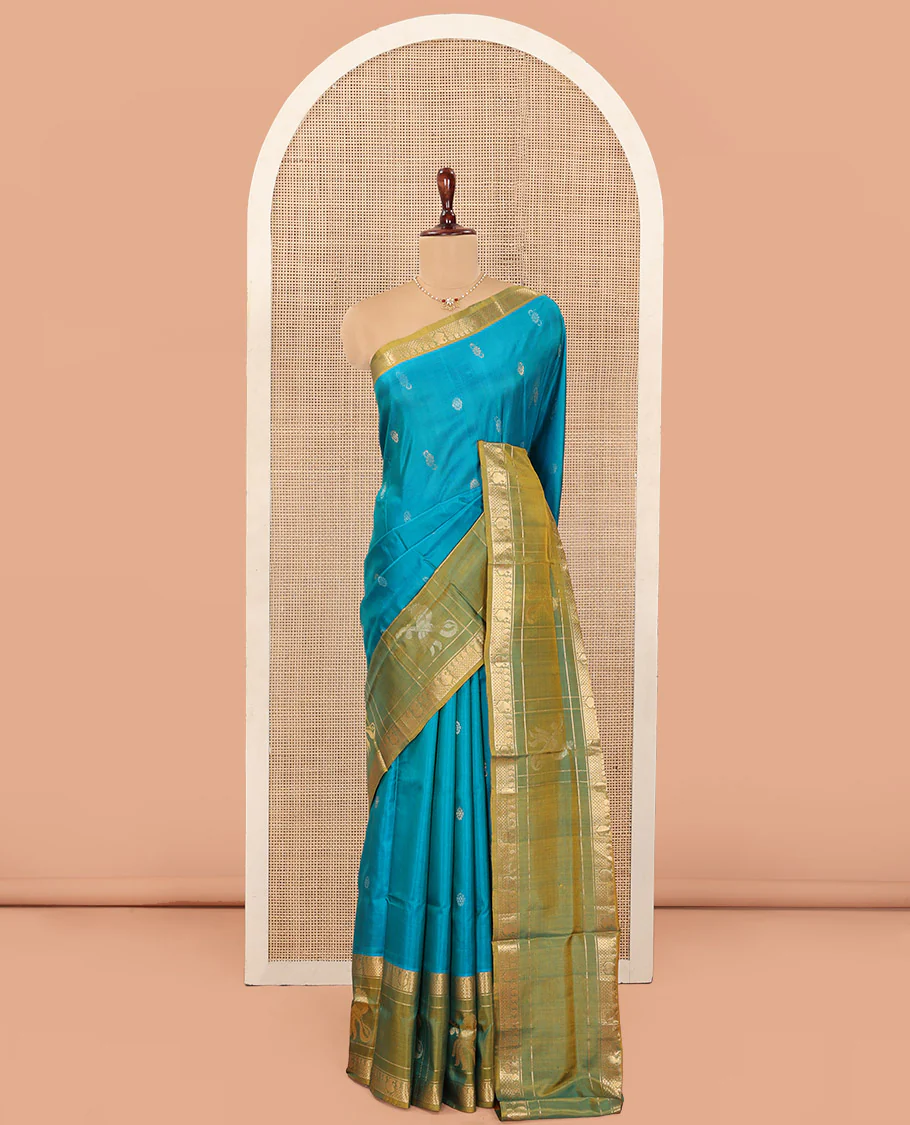 Blue Uppada Silk Saree Graced with Zari Buttas, Complemented by a Contrast Traditional Zari Border of Peacock Veena Designs, Contrast Pallu of Floral Jaal Designs, and Paired with a Contrast Blouse - Image 4