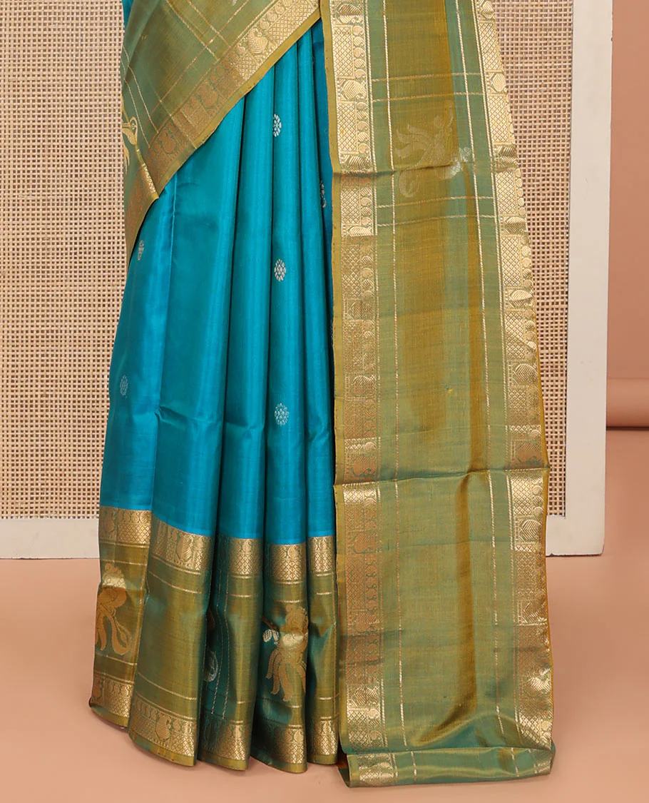 Blue Uppada Silk Saree Graced with Zari Buttas, Complemented by a Contrast Traditional Zari Border of Peacock Veena Designs, Contrast Pallu of Floral Jaal Designs, and Paired with a Contrast Blouse - Image 5