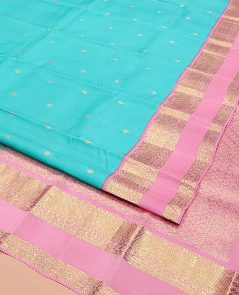 Blue Vasundhara Lite Silk Mix Saree, Adorned with Zari Buttas on Its Body, Complemented by a Contrast Retti Pettu Border of Thilakam, Banaras, Mayil Kann, Muthu, and Kamalam Designs, Pallu Steeped with Feather Motifs, and Paired with a Contrast Blouse - Image 2