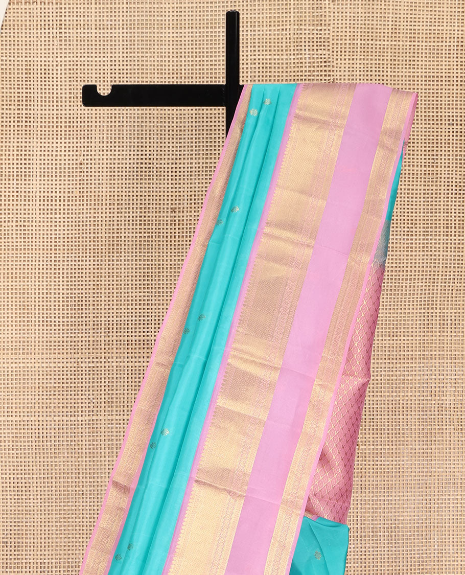 Blue Vasundhara Lite Silk Mix Saree, Adorned with Zari Buttas on Its Body, Complemented by a Contrast Retti Pettu Border of Thilakam, Banaras, Mayil Kann, Muthu, and Kamalam Designs, Pallu Steeped with Feather Motifs, and Paired with a Contrast Blouse - Image 3