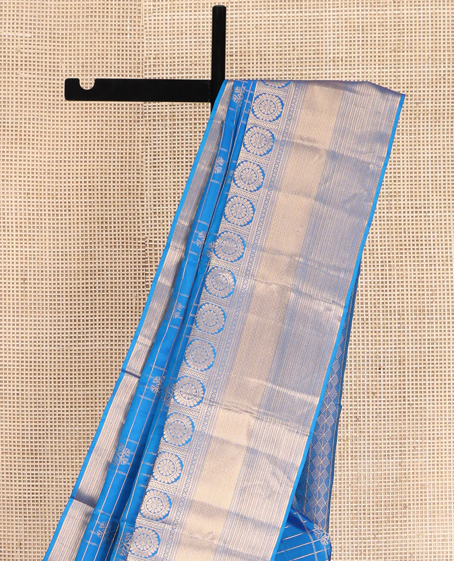 Blue Vasundhara Lite-Silk Mix Saree, Artfully Woven with Snowflake Buttas Enclosed Checks, Highlighted by Zari Border of Rekku, Chakram, Kathir, and Diamond Designs, Gleaming Jaal Pallu, and Paired with a Matching Blouse - Image 2