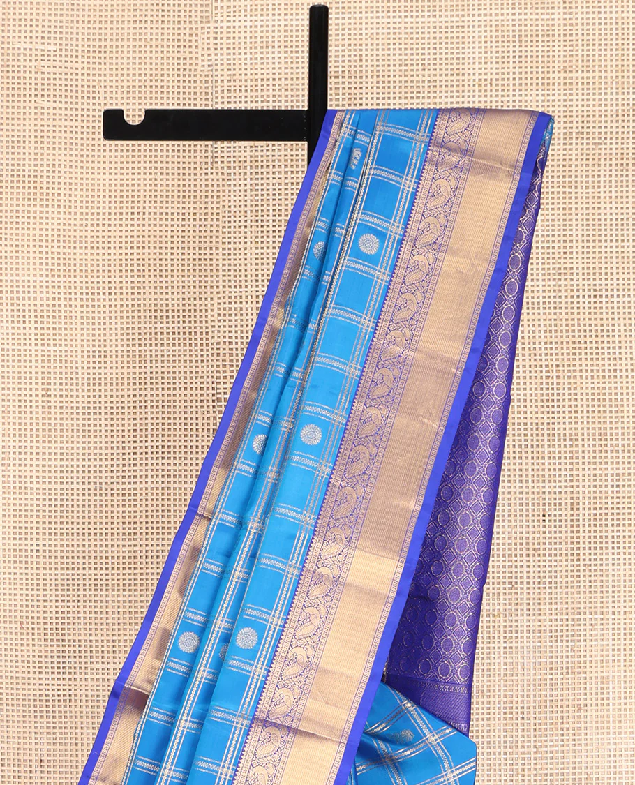 Blue Vasundhara Lite-Silk Mix Saree, Spotlighted with Yaanai, and Chakram Butta Enclosed Checks, Complemented by a Contrast Border of Thilakam, Poun, and Mayil Designs, Pallu Highlighted by Geometric Designs, and Paired with a Contrast Blouse - Image 2