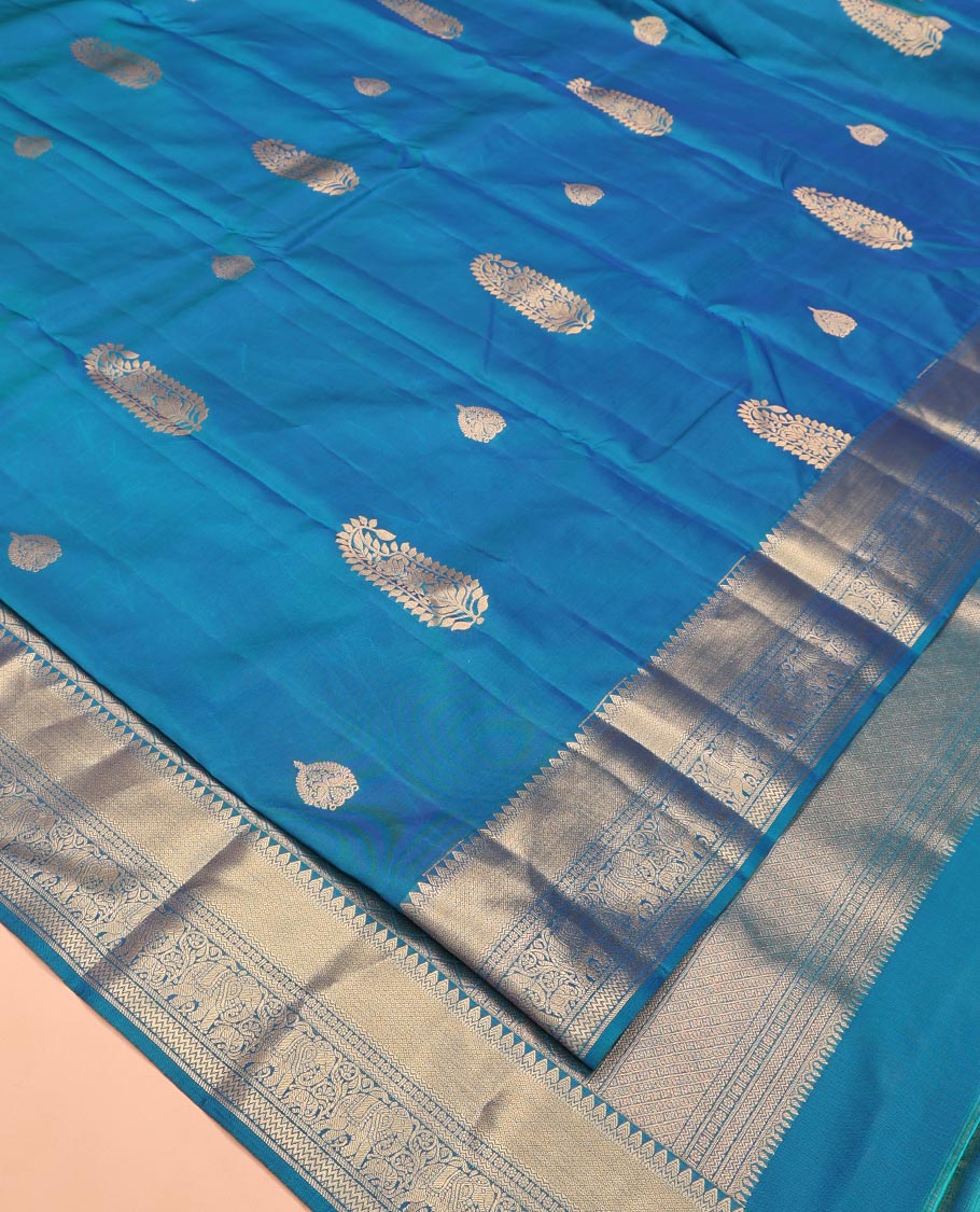 Blue Vasundhara Lite Silk Saree, Accentuated with Zari Buttas All Over Its Body, Highlighted by Zari Border of Thilakam, Mayil Kann, Kamalam, Rettai Neli, Yannai, and Vanki Designs, Delicately Woven Pallu and Paired with a Matching Blouse - Image 2