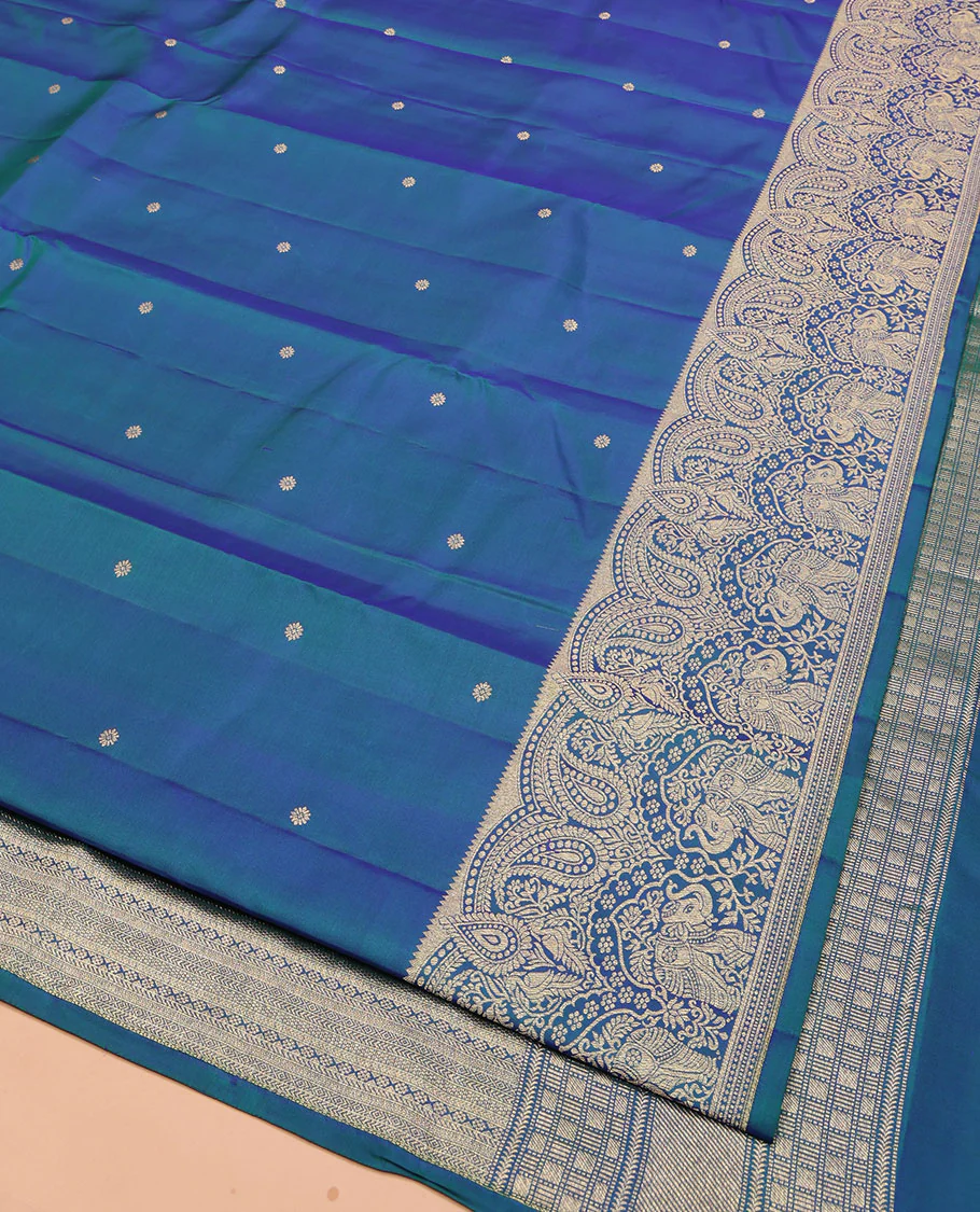 Blue Vasundhara Silk Saree, Accentuated with Zari Buttas All Over Its Body, Highlighted by a Zari Border of Manga and Yaanai Designs, Grand Geometric Patterned Pallu, and Paired with a Matching Blouse - Image 2