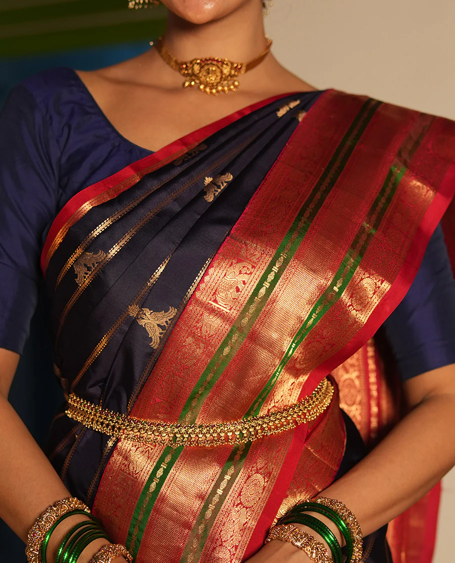 Blue Vasundhara Silk Saree, Accentuated with Zari Buttas and Stripes All Over Its Body, Complemented by a Contrast Border of Elephant, Mayil, and Chakram Designs, a Grand Pallu, and Paired with a Contrast Blouse - Image 3