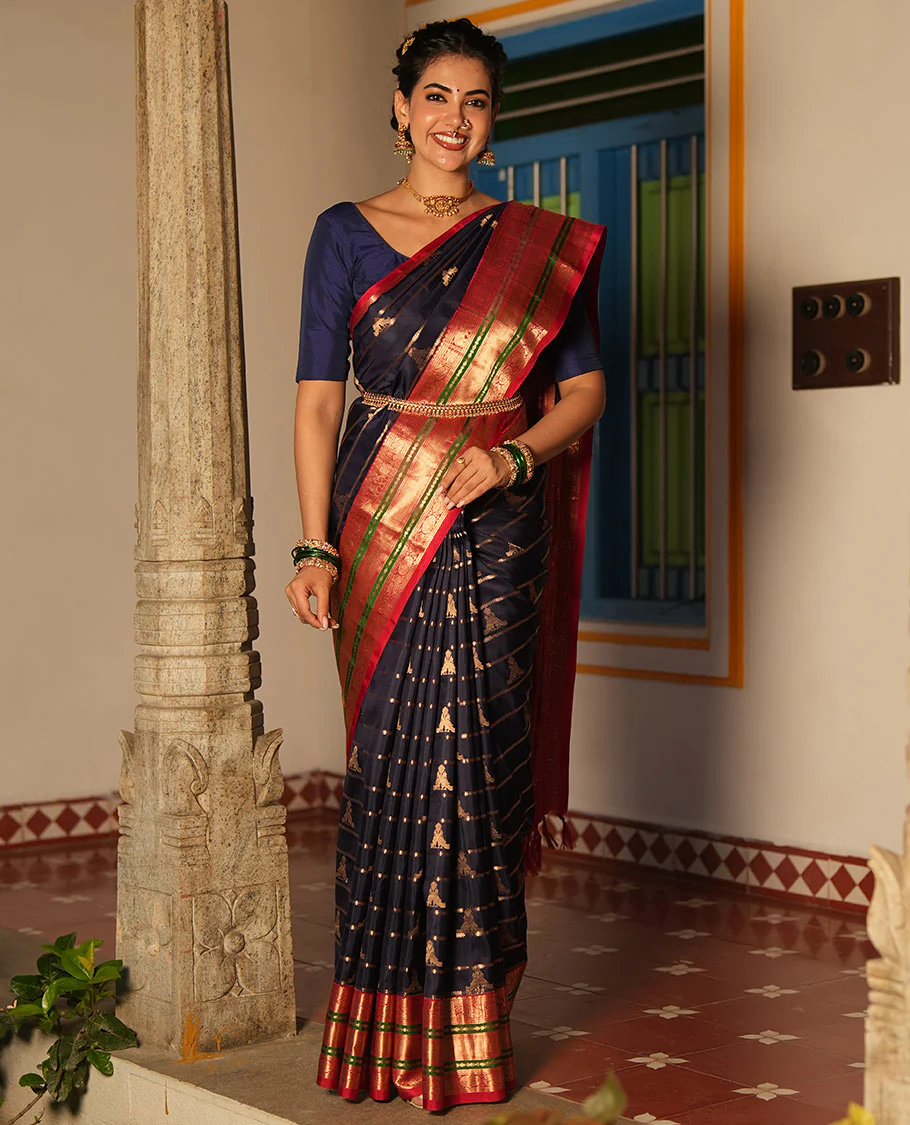 Blue Vasundhara Silk Saree, Accentuated with Zari Buttas and Stripes All Over Its Body, Complemented by a Contrast Border of Elephant, Mayil, and Chakram Designs, a Grand Pallu, and Paired with a Contrast Blouse - Image 4