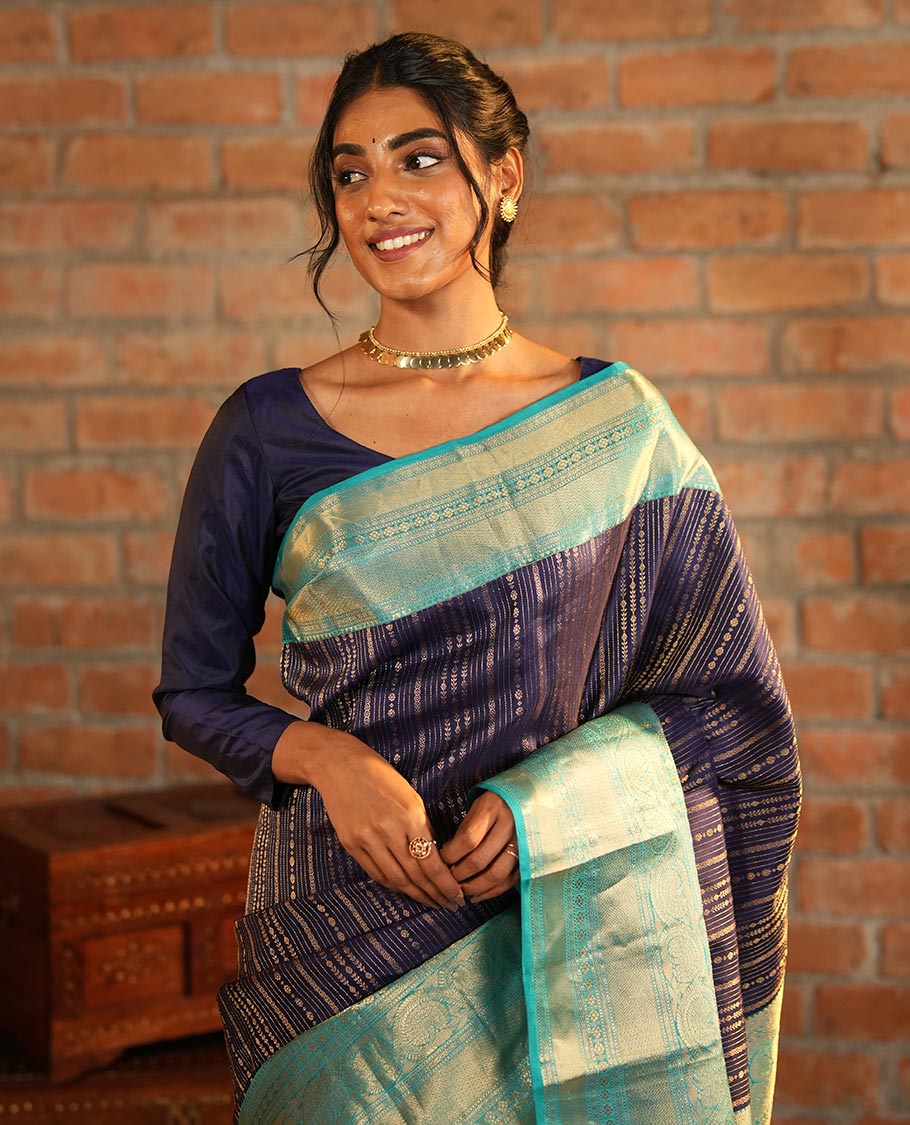 Blue Vasundhara Silk Saree Adorned with Jacquard Design Weave All Over Its Body, Complemented by a Contrast Border of Rekku, Muthu, Laddu Kamalam, Then Kuli Kann, and Dhavana Kodi Designs, Artfully Zari Woven Pallu, and Paired with a Contrast Blouse - Image 5