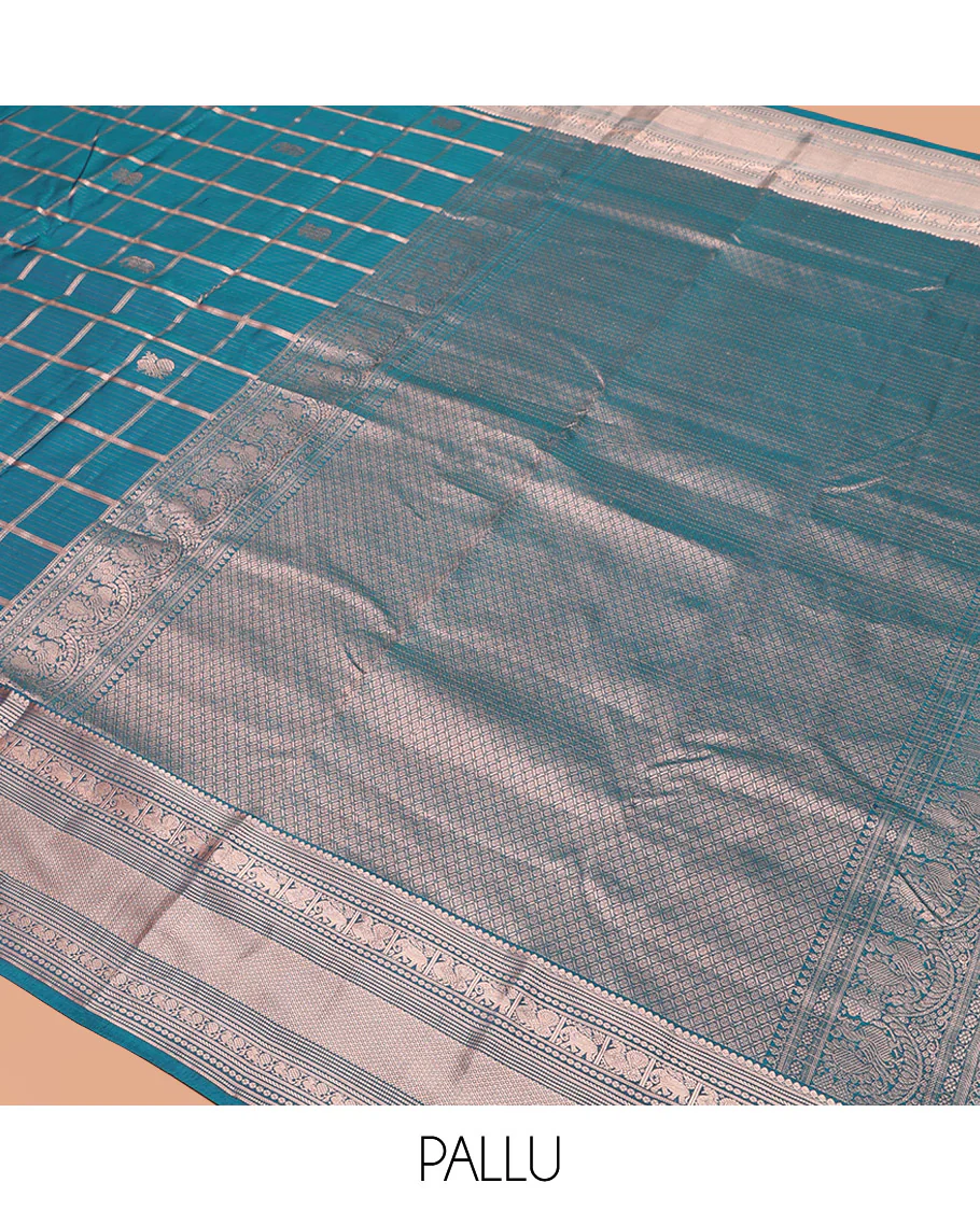 Blue Vasundhara Silk Saree Beautifully Bedecked with Medium Zari Checks, Highlighted by a Zari Border of Salngai, Mayil, Yaanai, Muthu, and Mayil Kann Designs, Delicately Woven Pallu, and Paired with a Matching Blouse - Image 5