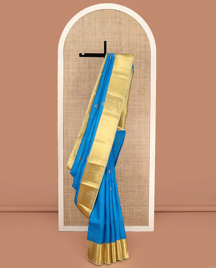 Blue Vasundhara Silk Saree, Decked Up with Zari Buttas All Over Its Body, Complemented by Contrast Border of Traditional Designs, Pallu of Floral Designs, and Paired with a Contrast Blouse
