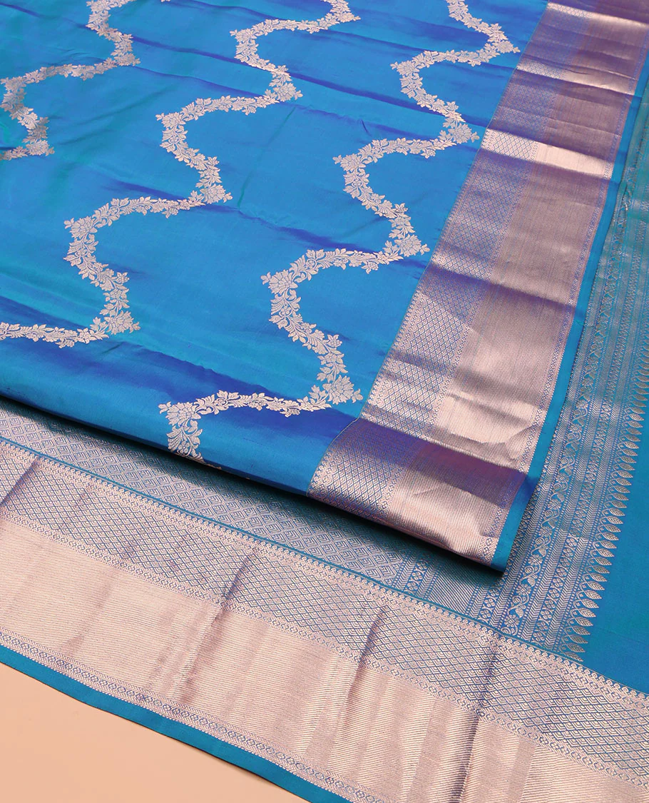 Blue Vasundhara Silk Saree, Delicately Woven with Jaal Jacquard Design All Over Its Body, Highlighted by a Zari Border of Thilakam Mokku, Jaal, and Lavangam Designs, Grand Jaal Pallu, and Paired with a Matching Blouse - Image 2