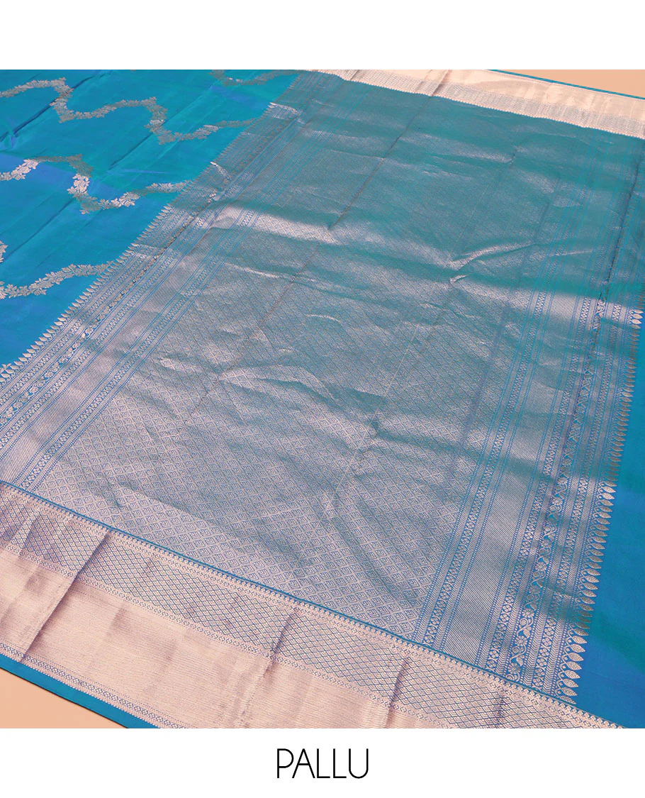 Blue Vasundhara Silk Saree, Delicately Woven with Jaal Jacquard Design All Over Its Body, Highlighted by a Zari Border of Thilakam Mokku, Jaal, and Lavangam Designs, Grand Jaal Pallu, and Paired with a Matching Blouse - Image 5