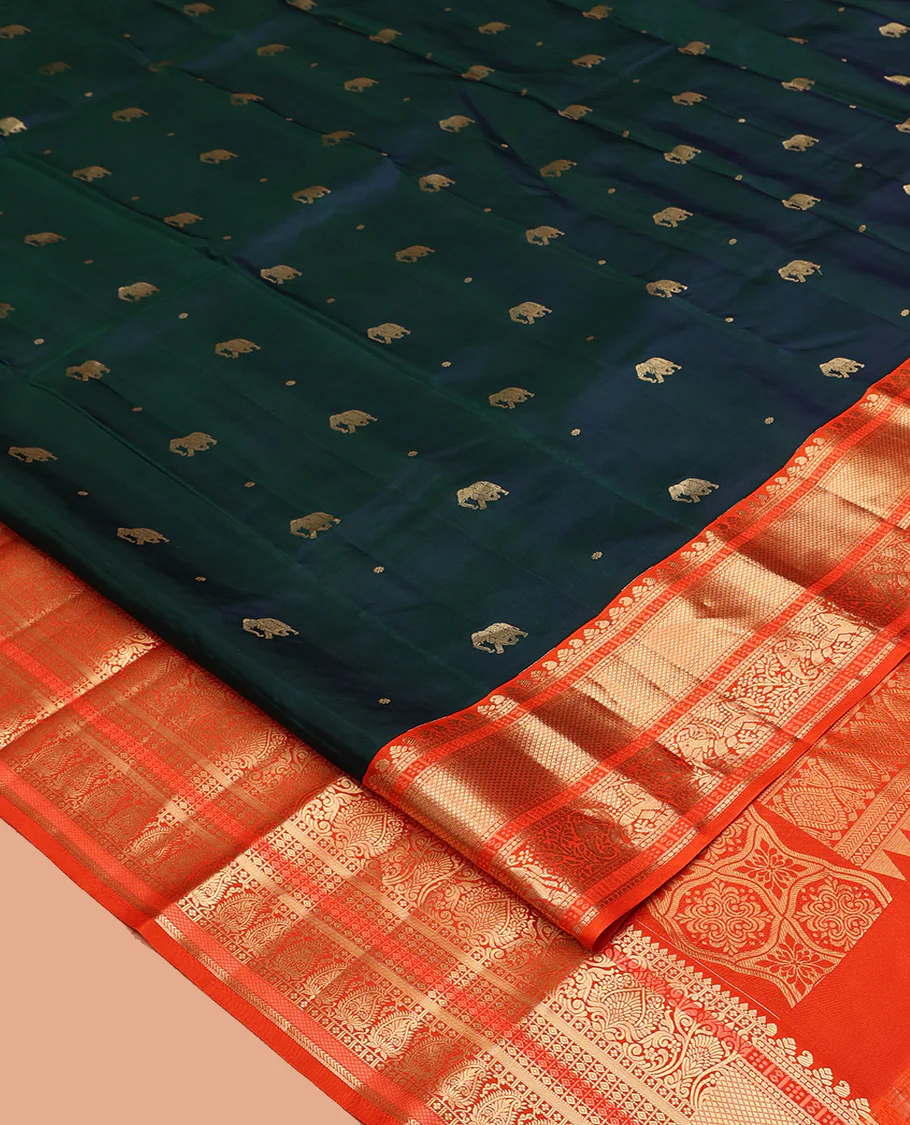 Blue Vasundhara Silk Saree, Embellished with Zari Buttas All Over Its Body, Complemented by a Contrast Border of Kuyil Kann, and Yaanai Designs, Grand Jaal Pallu, and Paired with a Contrast Blouse - Image 2