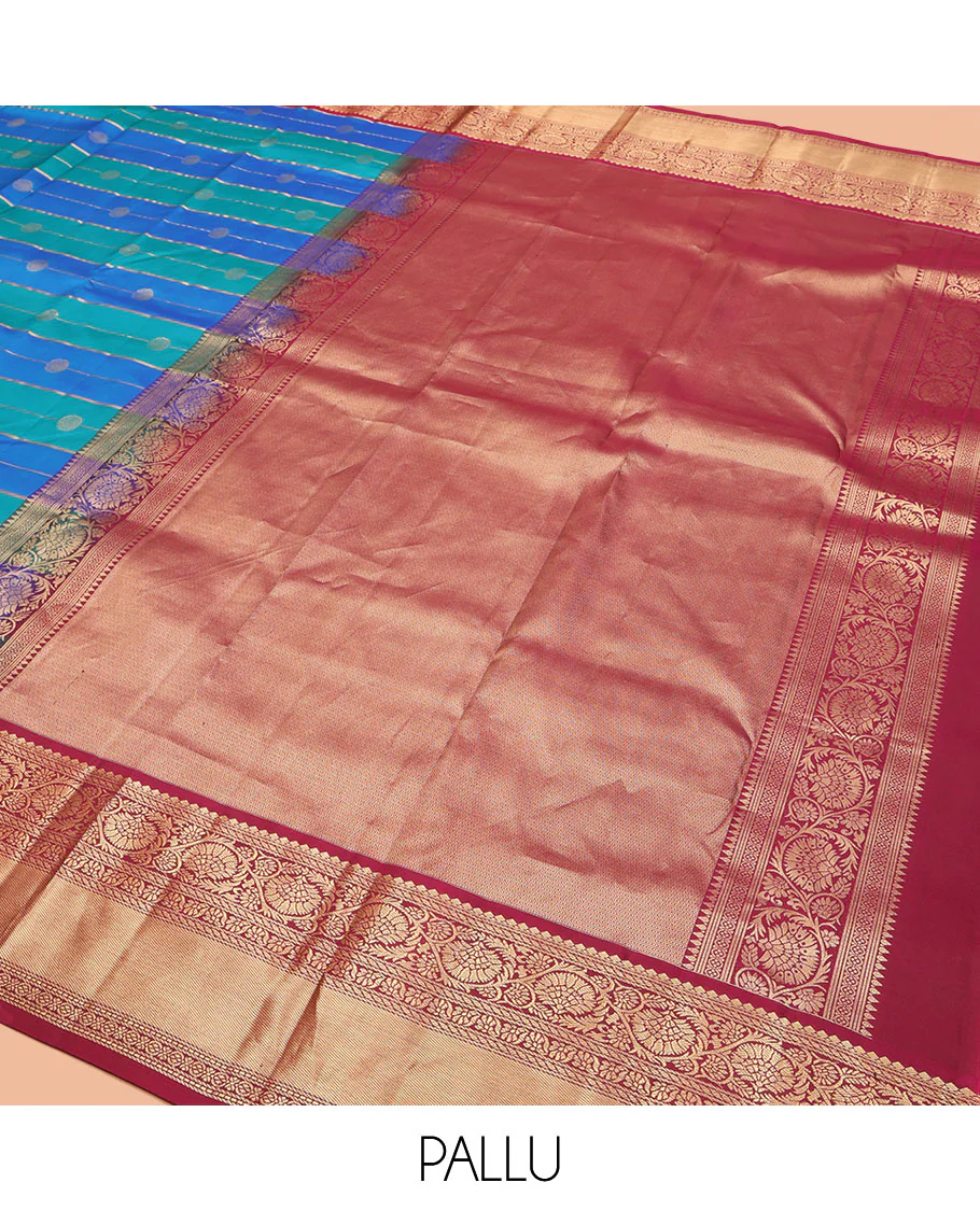 Blue Vasundhara Silk Saree, Impeccably Styled with Zari Buttas and Zari Stripes All Over Its Body, Complemented by a Contrast Border of Salngai, Puli Nagam, and Kodi Visiry Designs, Grand Gleaming Zari Woven Pallu, and Paired with a Contrast Blouse - Image 5