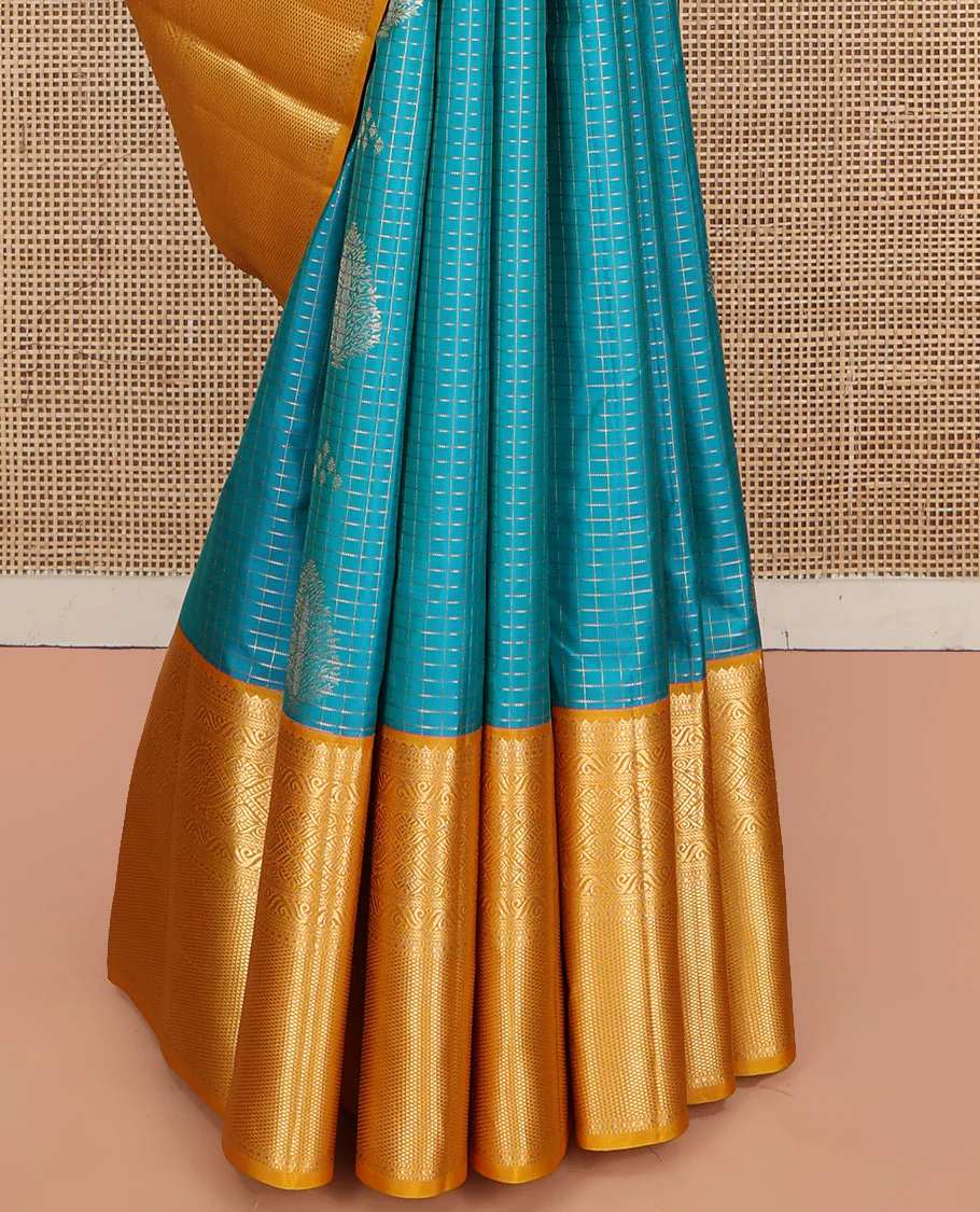 Blue Vasundhara Silk Saree, Masterfully Woven with Zari Buttas and Zari Checks All Over Its Body, Complemented by a Contrast Border of Traditional Designs, Grandly Woven Jaal Pallu, and Paired with a Contrast Blouse - Image 4