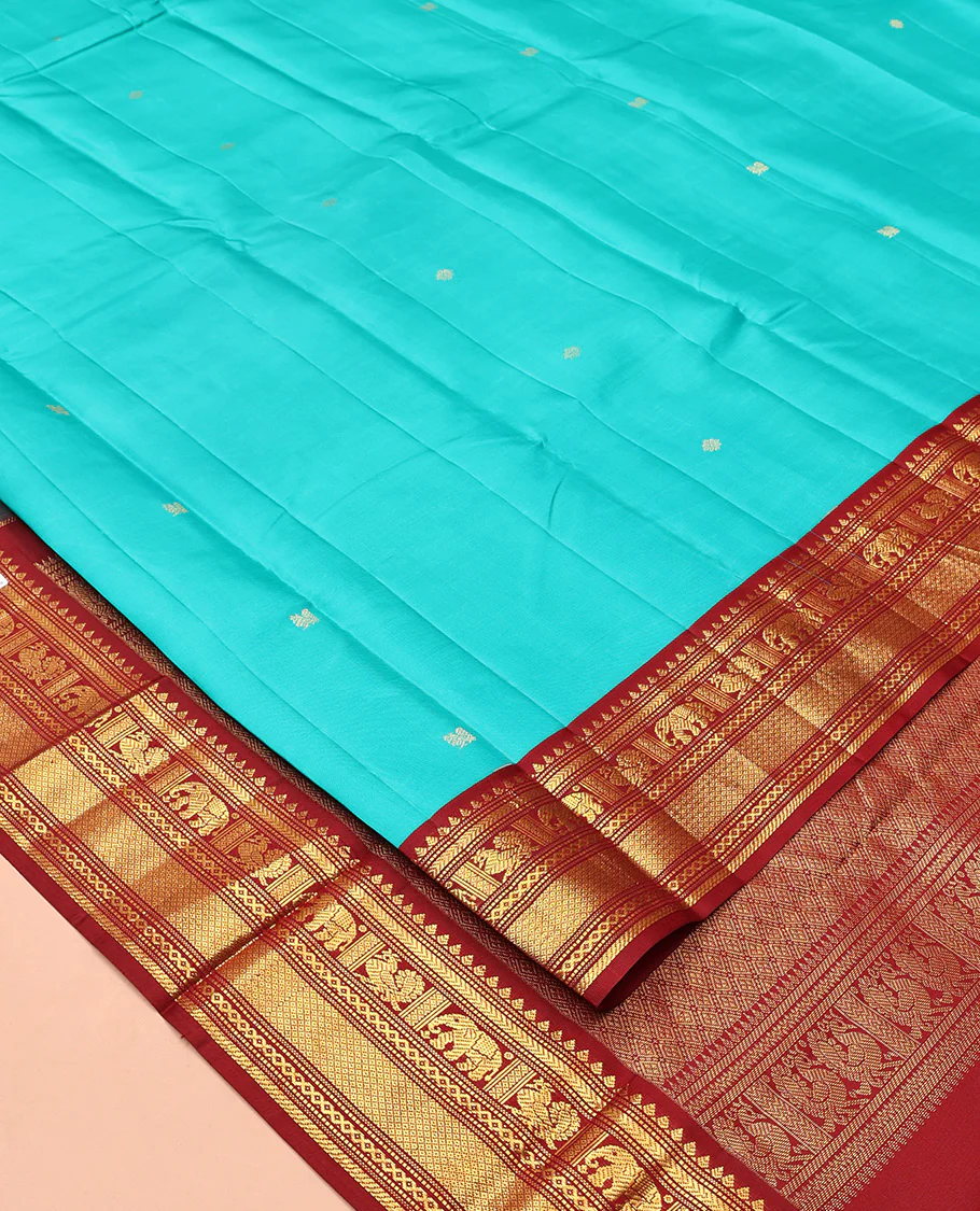 Blue Vasundhara Silk Saree, Mesmerized with Zari Buttas All Over Its Body, Complemented by a Contrast Border of Thilakam, Muthu, Yaanai, Mayil, and Mayil Kann Designs, Grand Jaal Pallu, and Paired with a Contrast Blouse - Image 2