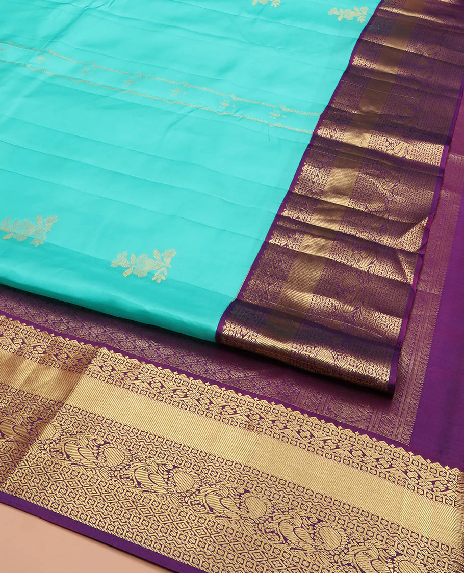 Blue Vasundhara Silk Saree Prettified with Zari Buttas, Complemented by a Contrast Blouse of Banaras, Paisa, Diamond, and Mayil Designs, Grandly Woven Pallu of Jaal Designs, and a Contrast Zari Bordered Blouse - Image 2