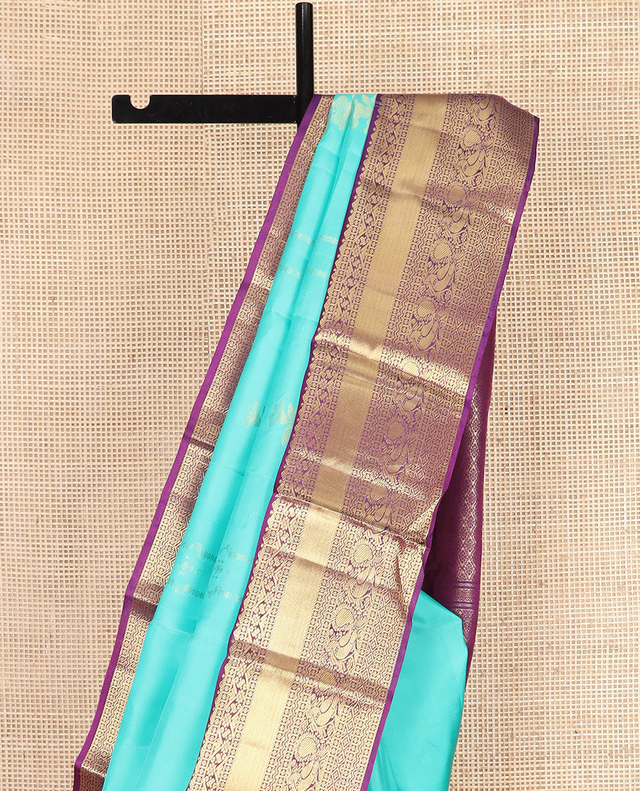 Blue Vasundhara Silk Saree Prettified with Zari Buttas, Complemented by a Contrast Blouse of Banaras, Paisa, Diamond, and Mayil Designs, Grandly Woven Pallu of Jaal Designs, and a Contrast Zari Bordered Blouse - Image 3