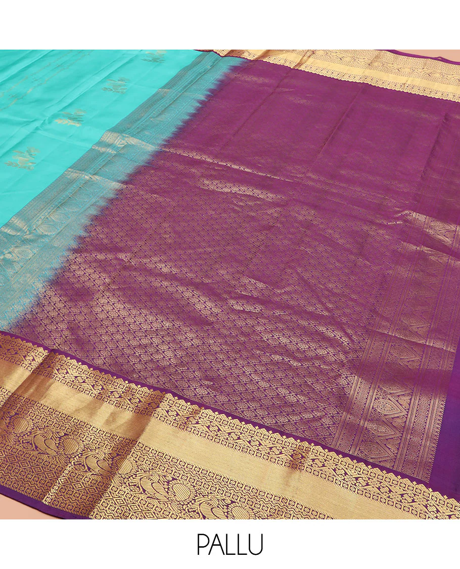 Blue Vasundhara Silk Saree Prettified with Zari Buttas, Complemented by a Contrast Blouse of Banaras, Paisa, Diamond, and Mayil Designs, Grandly Woven Pallu of Jaal Designs, and a Contrast Zari Bordered Blouse - Image 5