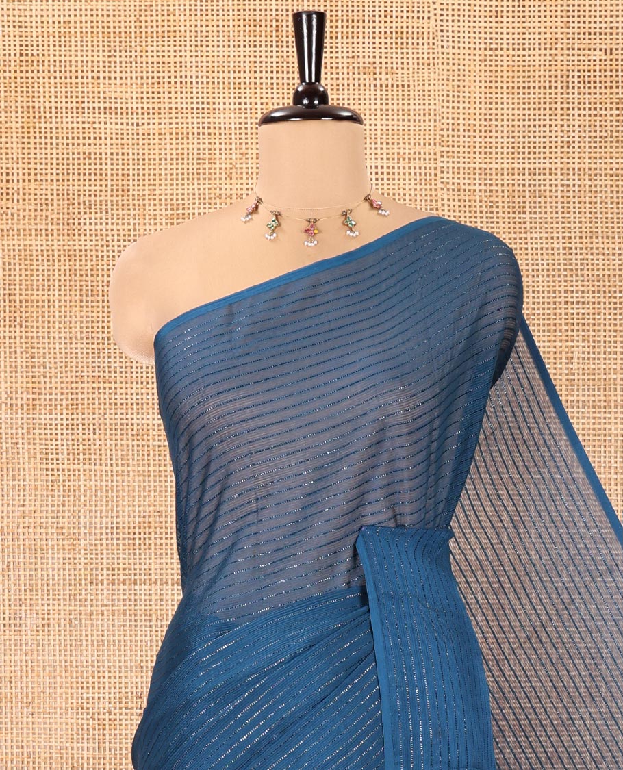 Borderless Blue Chiffon Saree, Gleamed Up with Horizontal Stripes on Its Body, a Self-Pallu, and Comes Without a Blouse - Image 2
