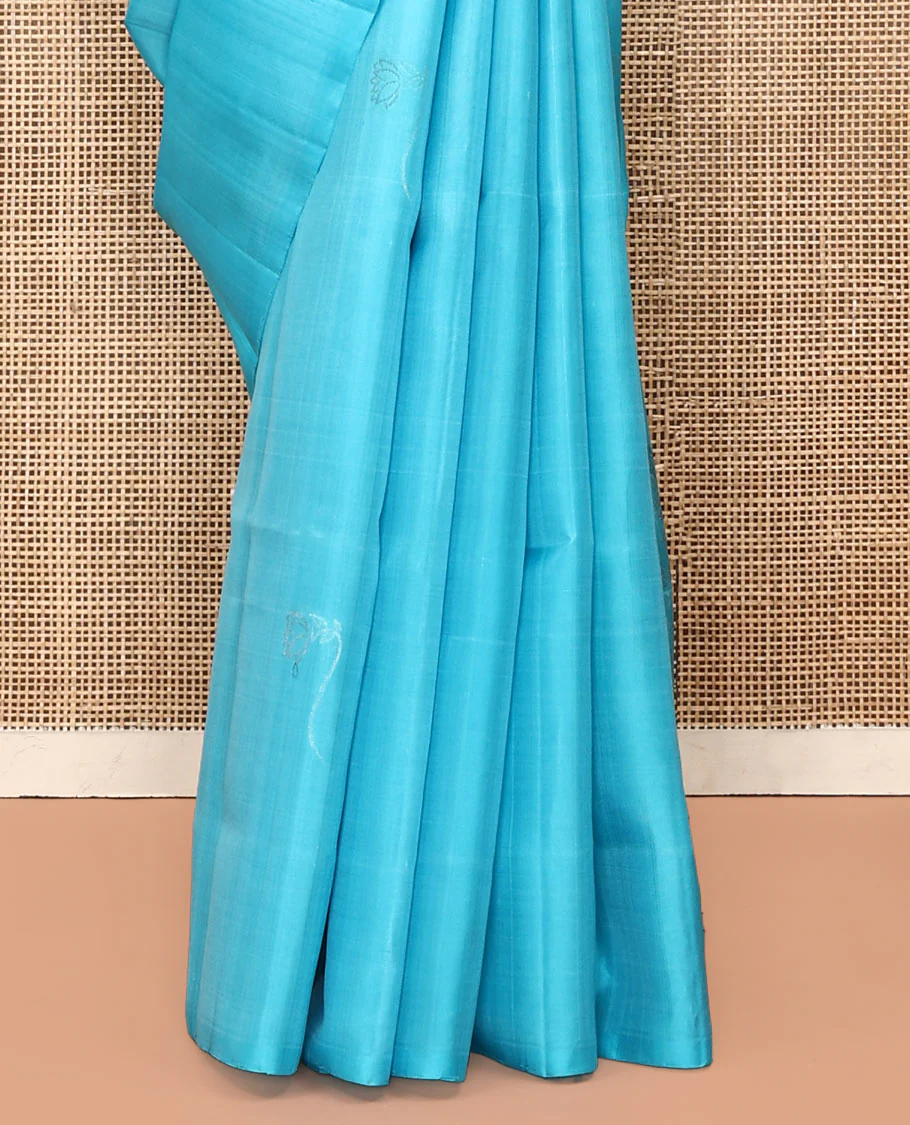 Borderless Blue Mayuri Soft Silk Saree, Beautified with Zari Buttas All Over Its Body, Sparsely Woven Pallu of Jaal and Floral Designs, and Paired with a Matching Blouse - Image 4