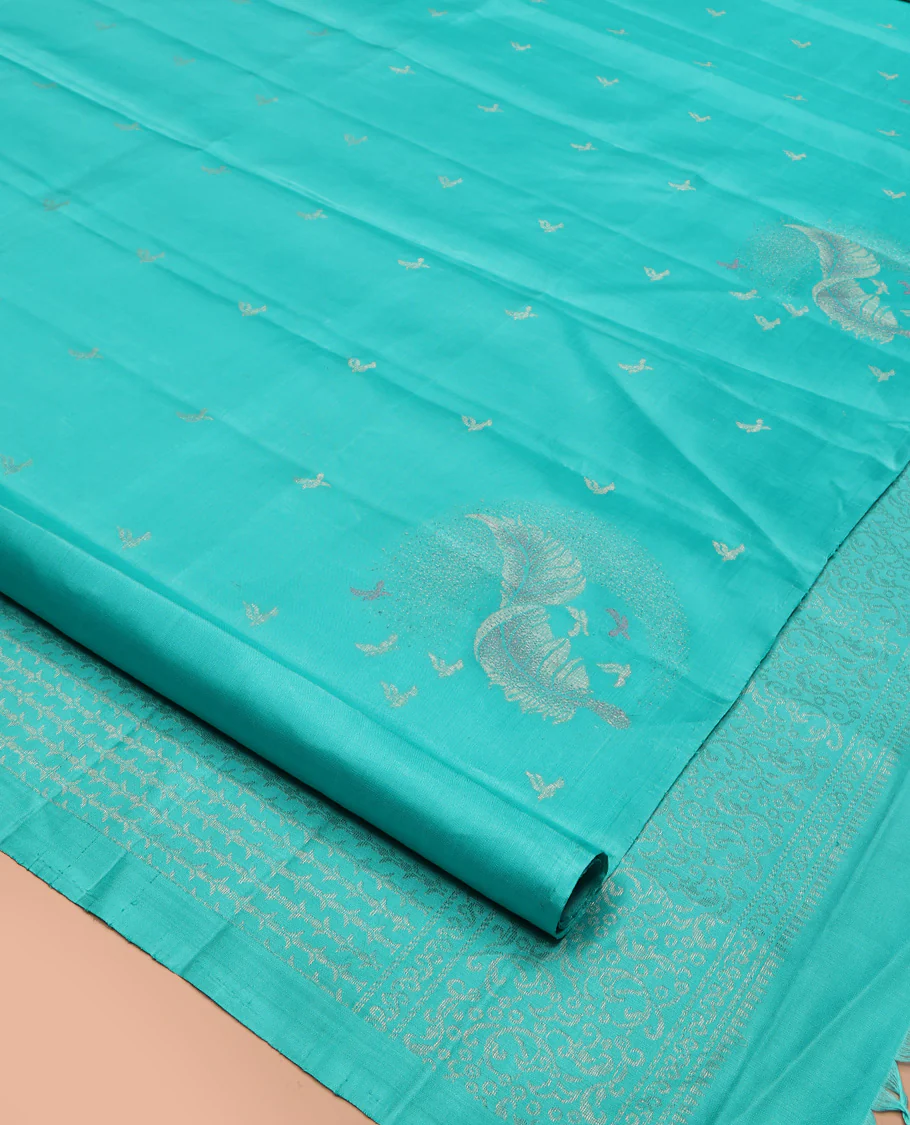 Borderless Blue Mayuri Soft Silk Saree, Subtly Woven with Buttas All Over Its Body, Highlighted by Pallu of Sparsely Woven Designs, and Paired with a Matching Blouse - Image 2