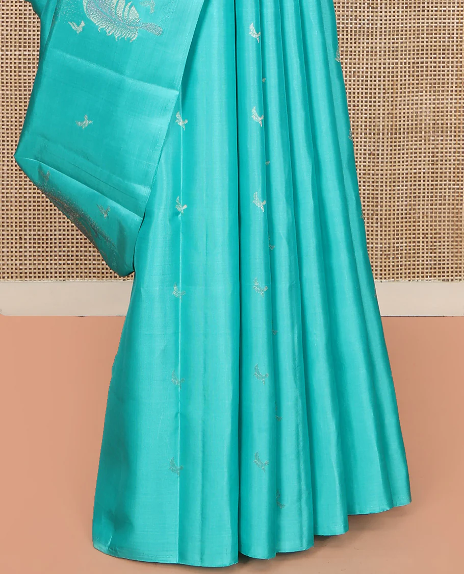 Borderless Blue Mayuri Soft Silk Saree, Subtly Woven with Buttas All Over Its Body, Highlighted by Pallu of Sparsely Woven Designs, and Paired with a Matching Blouse - Image 4