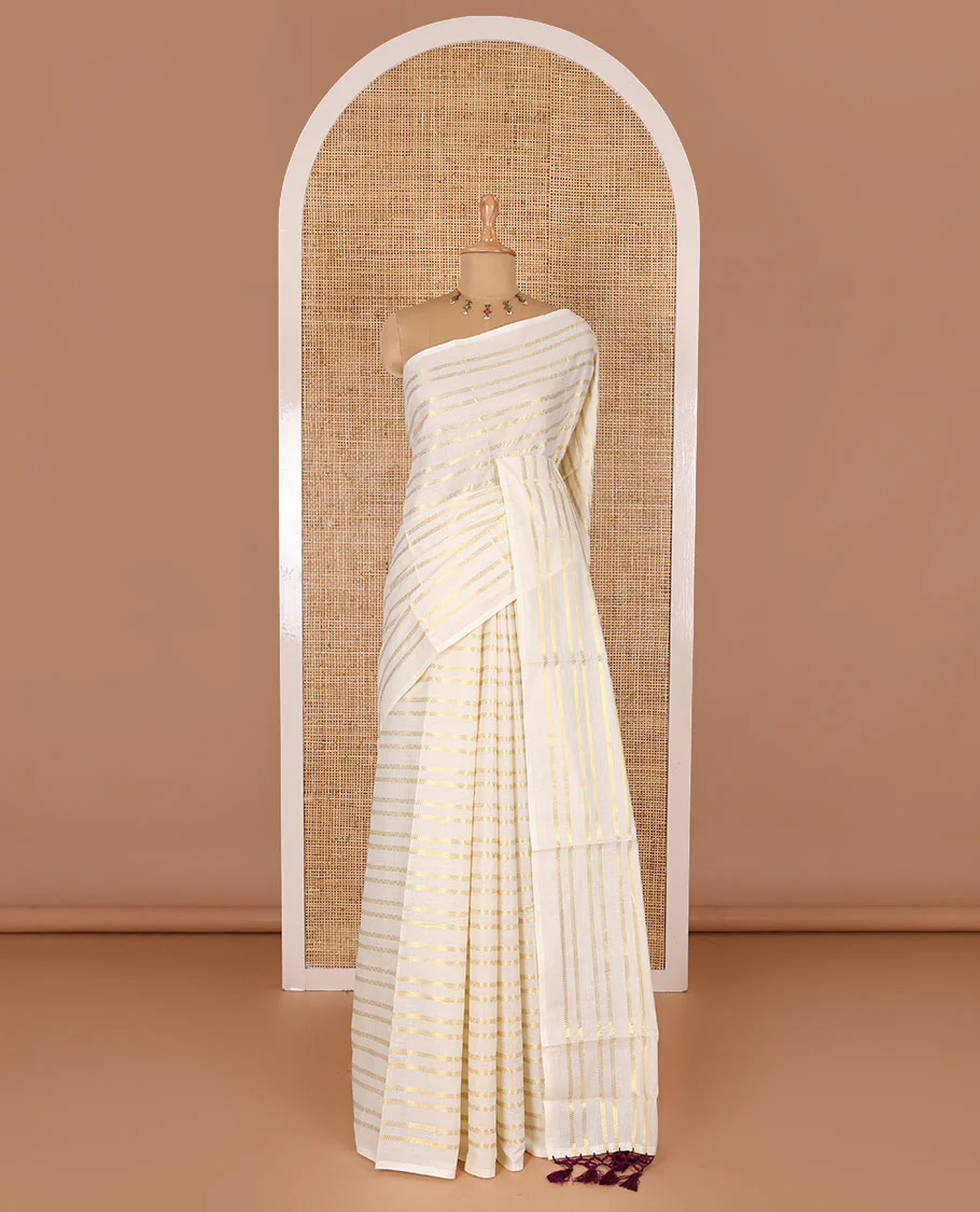 Borderless cream and maroon horizontal zari muthu striped Kerala cotton saree, self-pallu with tassels and a matching blouse - Image 4