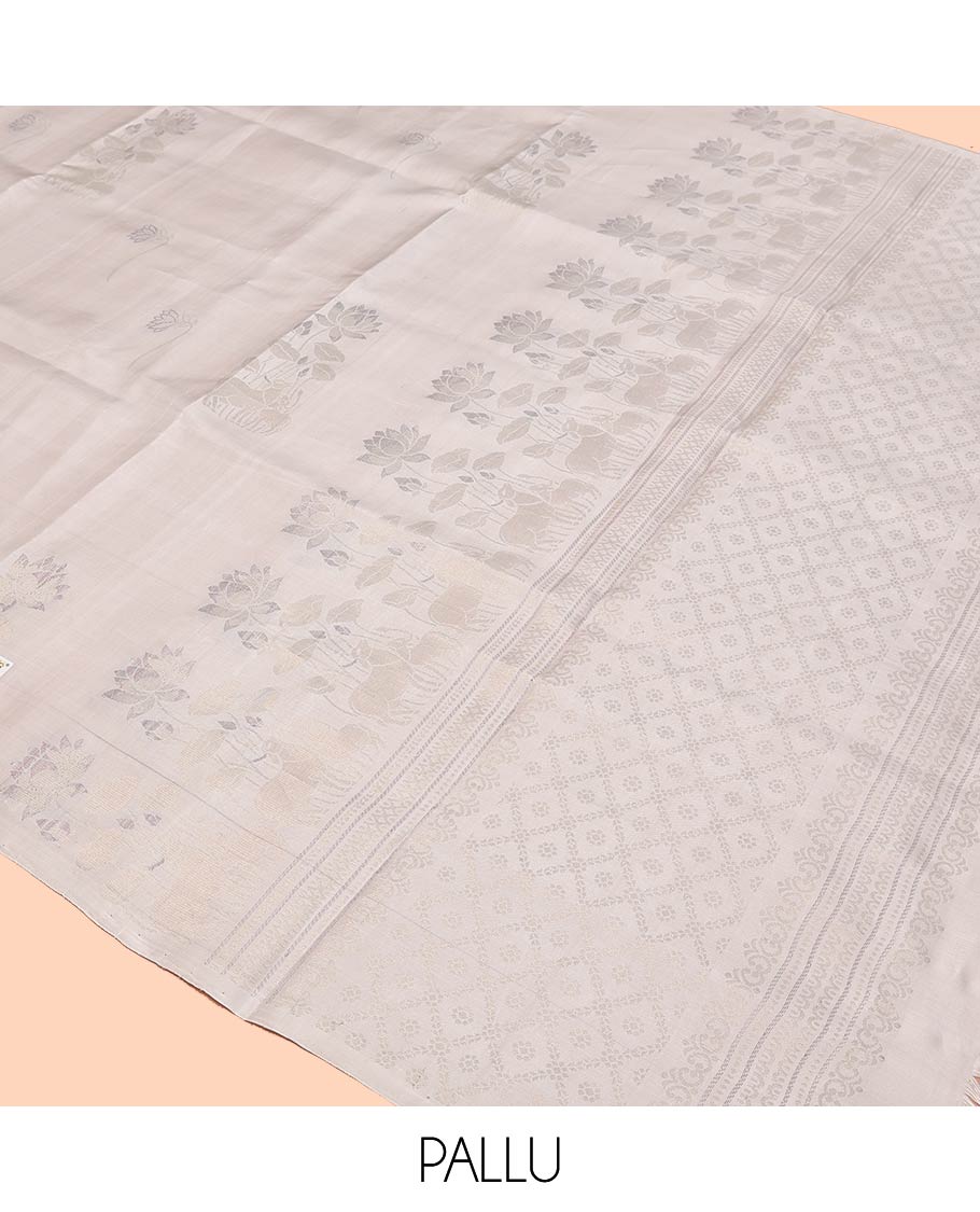 Borderless Cream Mayuri Soft Silk Saree, Sparsely Woven with Pichwai Lotus and Cow Buttas All Over Its Body, Highlighted by Pallu of Pichwai Designs, and Paired with a Matching Blouse - Image 5