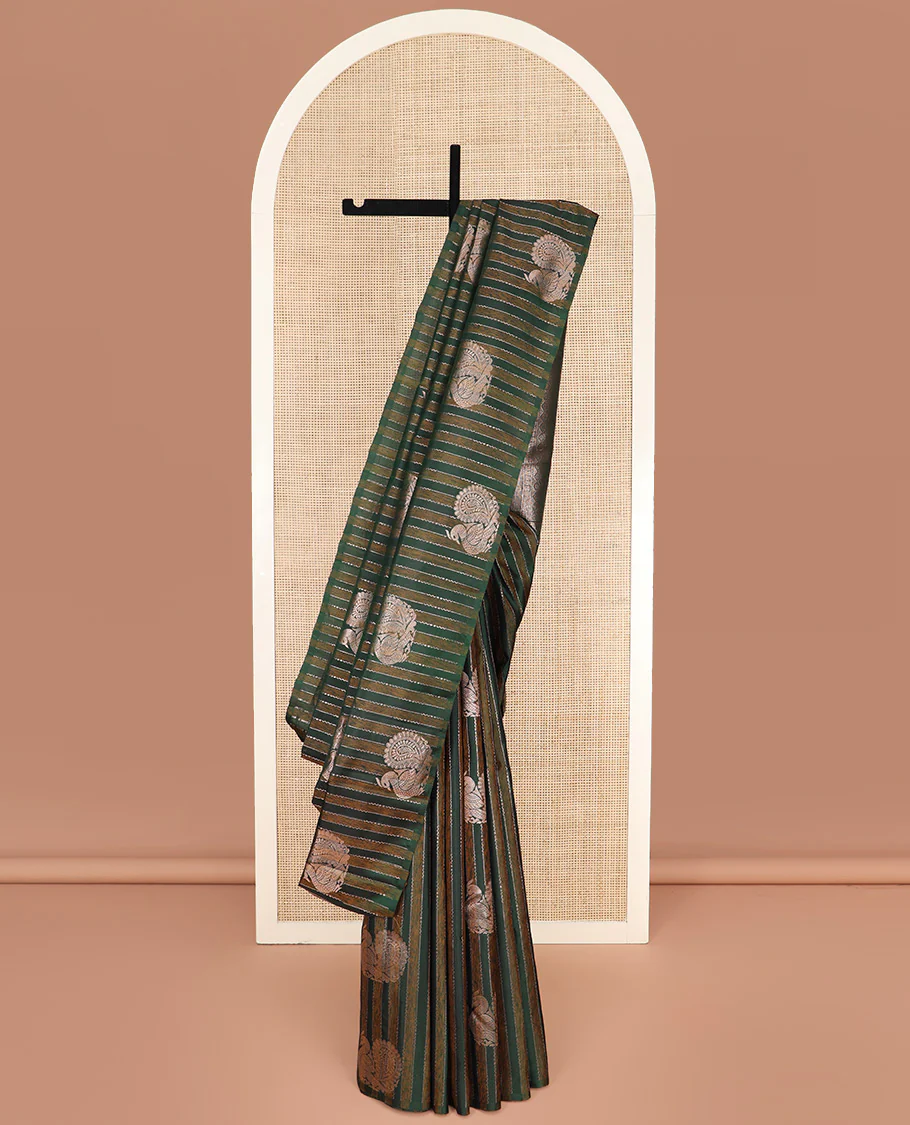 Borderless Green Kanchipuram Silk Saree Highlighted by Annam Buttas and Stripes All Over Its Body, Subtly Sparkled Pallu of Rudraksham, Muthu, Kathir, and Laddu Kamalam Designs, and Paired with a Matching Blouse
