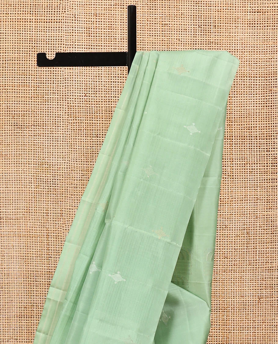 Borderless Green Mayuri Soft Silk Saree, Woven with Buttas All Over Its Body, Sparsely Sparkled Pallu, and Paired with a Matching Blouse - Image 3