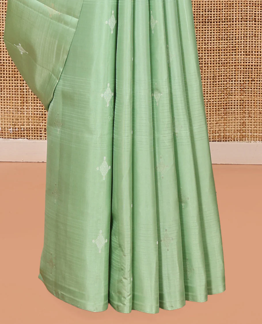 Borderless Green Mayuri Soft Silk Saree, Woven with Buttas All Over Its Body, Sparsely Sparkled Pallu, and Paired with a Matching Blouse - Image 4