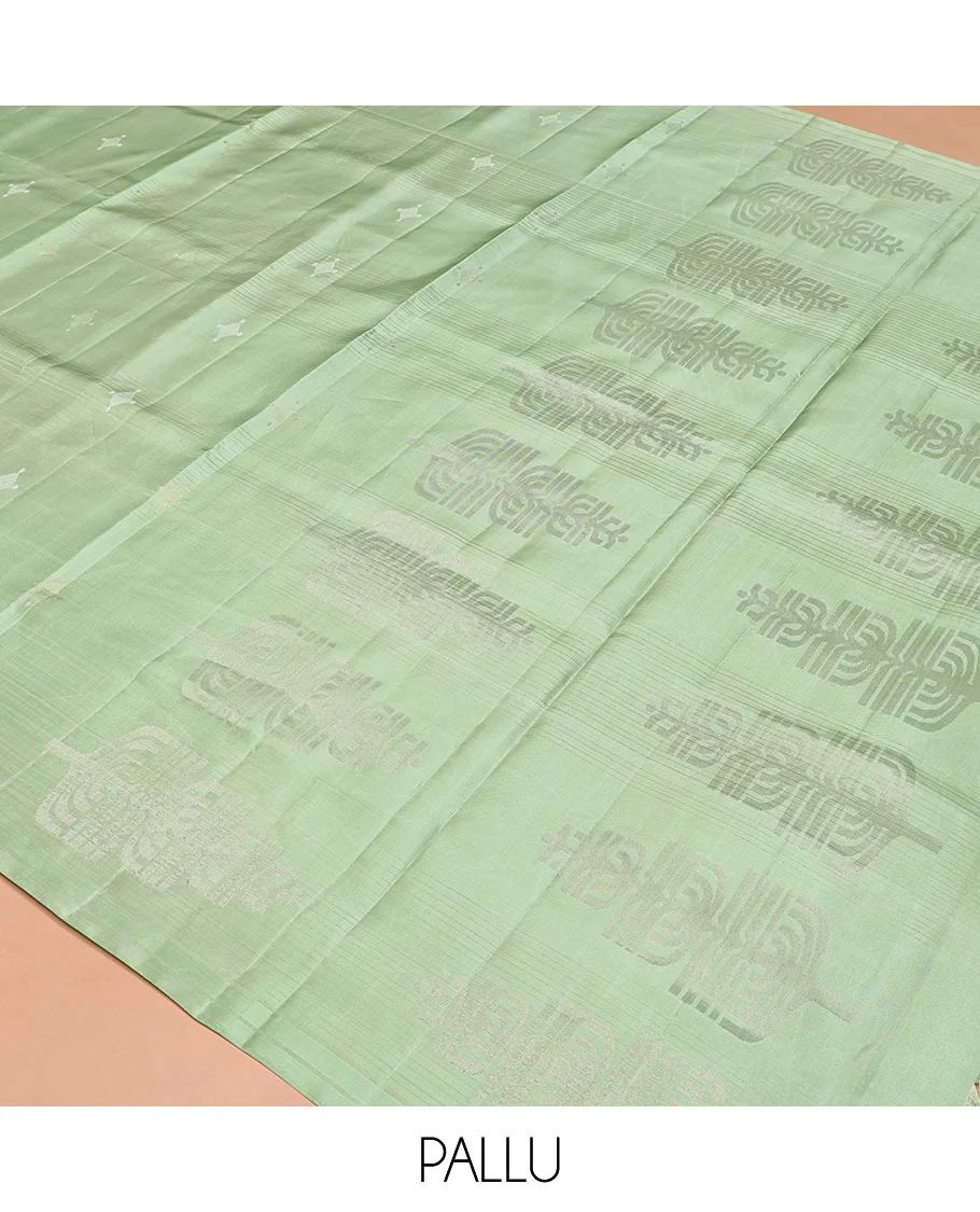 Borderless Green Mayuri Soft Silk Saree, Woven with Buttas All Over Its Body, Sparsely Sparkled Pallu, and Paired with a Matching Blouse - Image 5