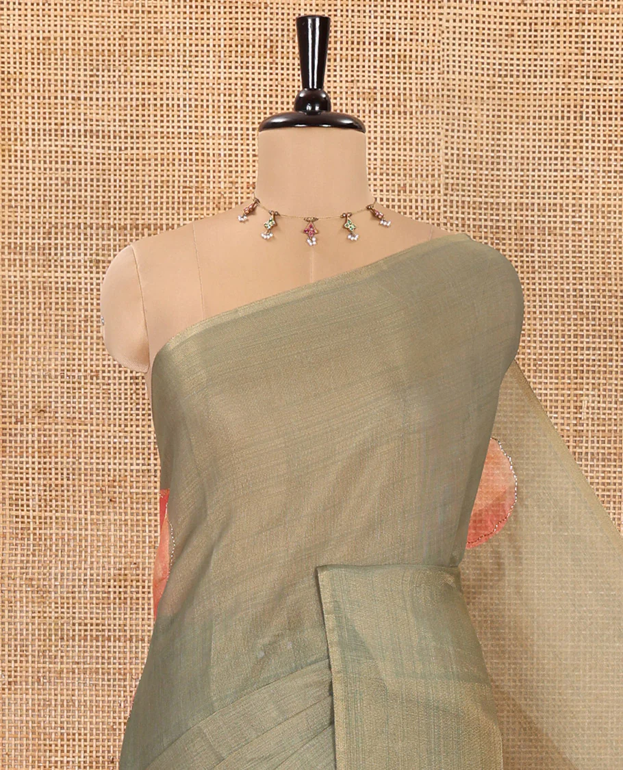 Borderless Green Tissue Saree, Elevated with Big Leaf Motifs Print, and Outline Embroidery All Over the Saree, Paired with a Subtle Leaf Motifs Printed Blouse - Image 2
