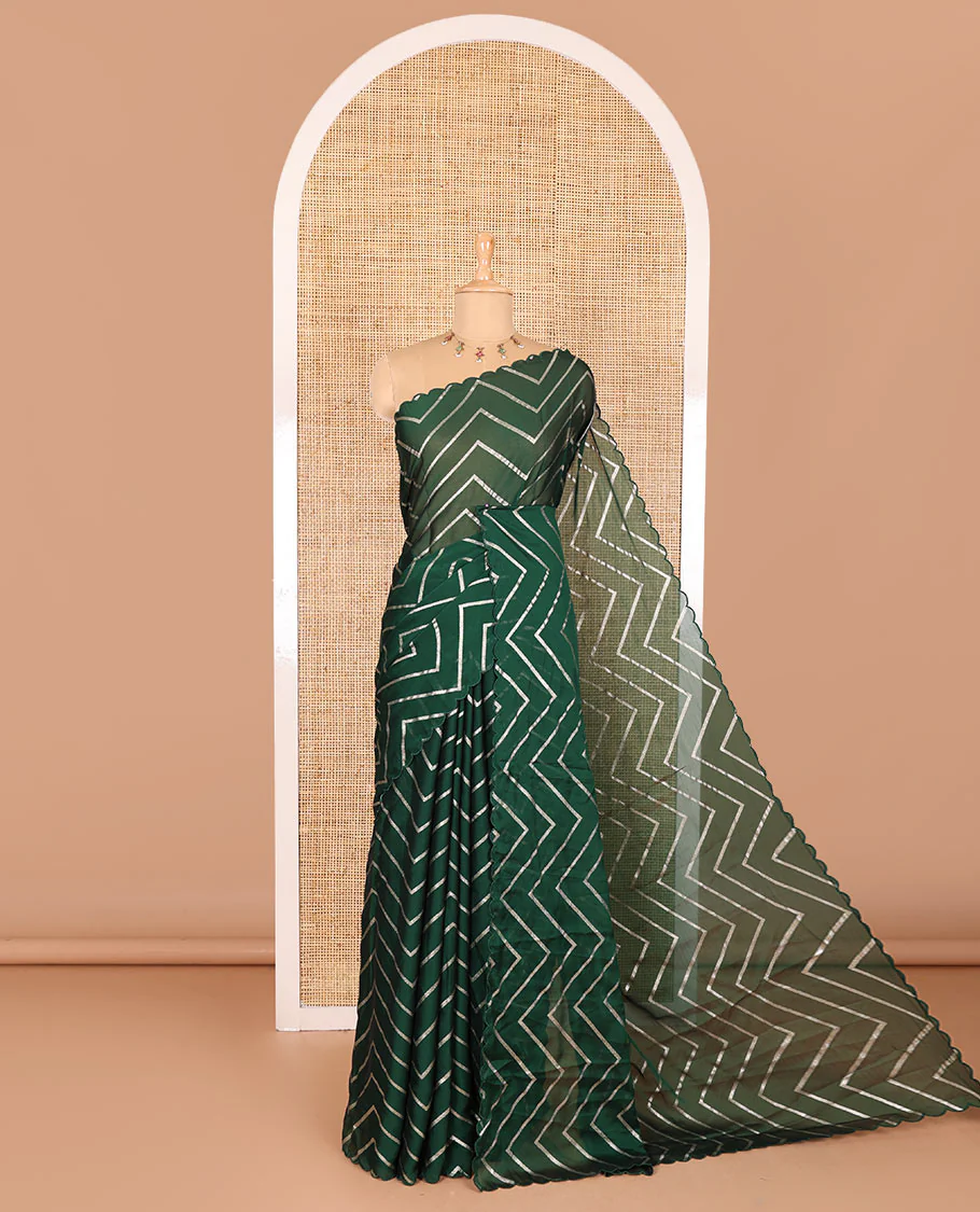 Borderless green zig-zag stripes gold foil printed, scallop-edged rangoli chiffon saree with a matching bandhani dotted blouse
