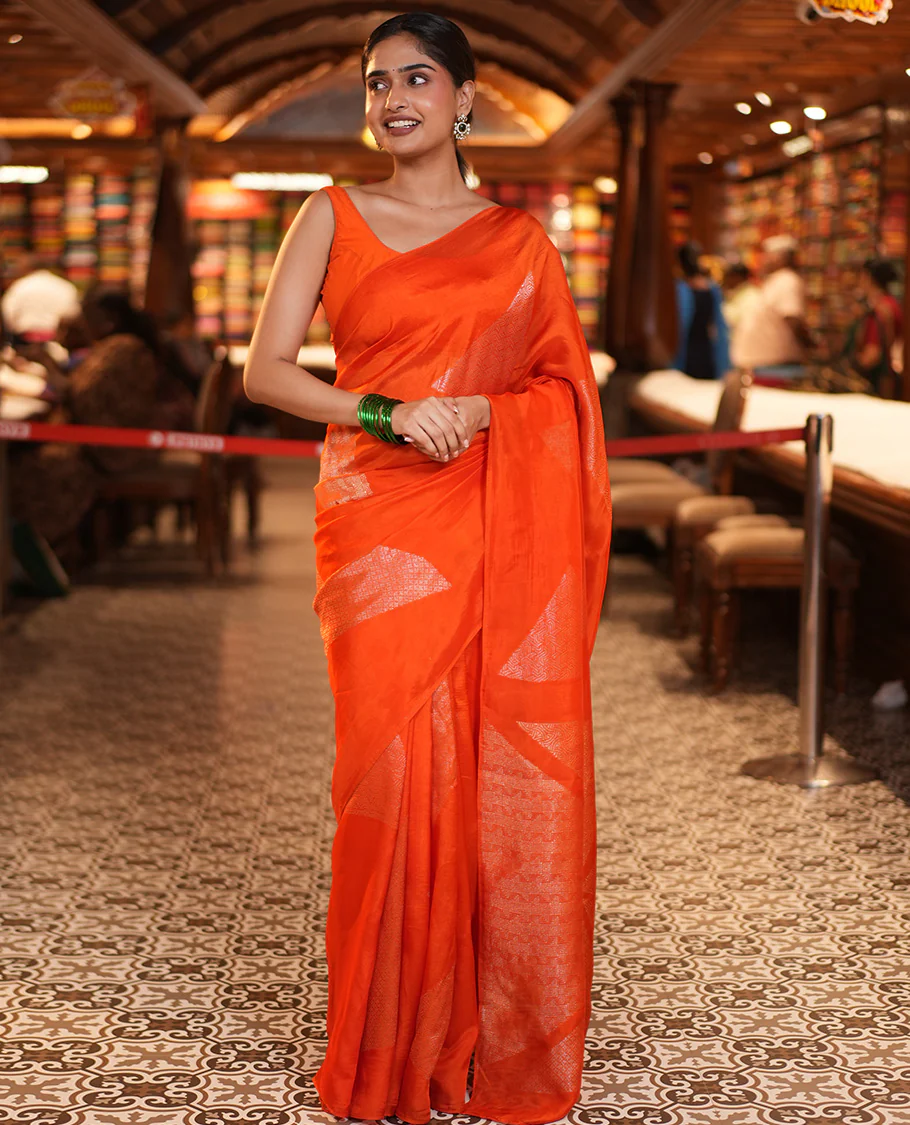 Borderless Orange Chanderi Cotton Saree, Richly Detailed with Zari Triangle Motifs Steeped All Over Its Body, Highlighted by Grand Zari Rich Pallu, and Paired with a Matching Brocade Blouse - Image 2