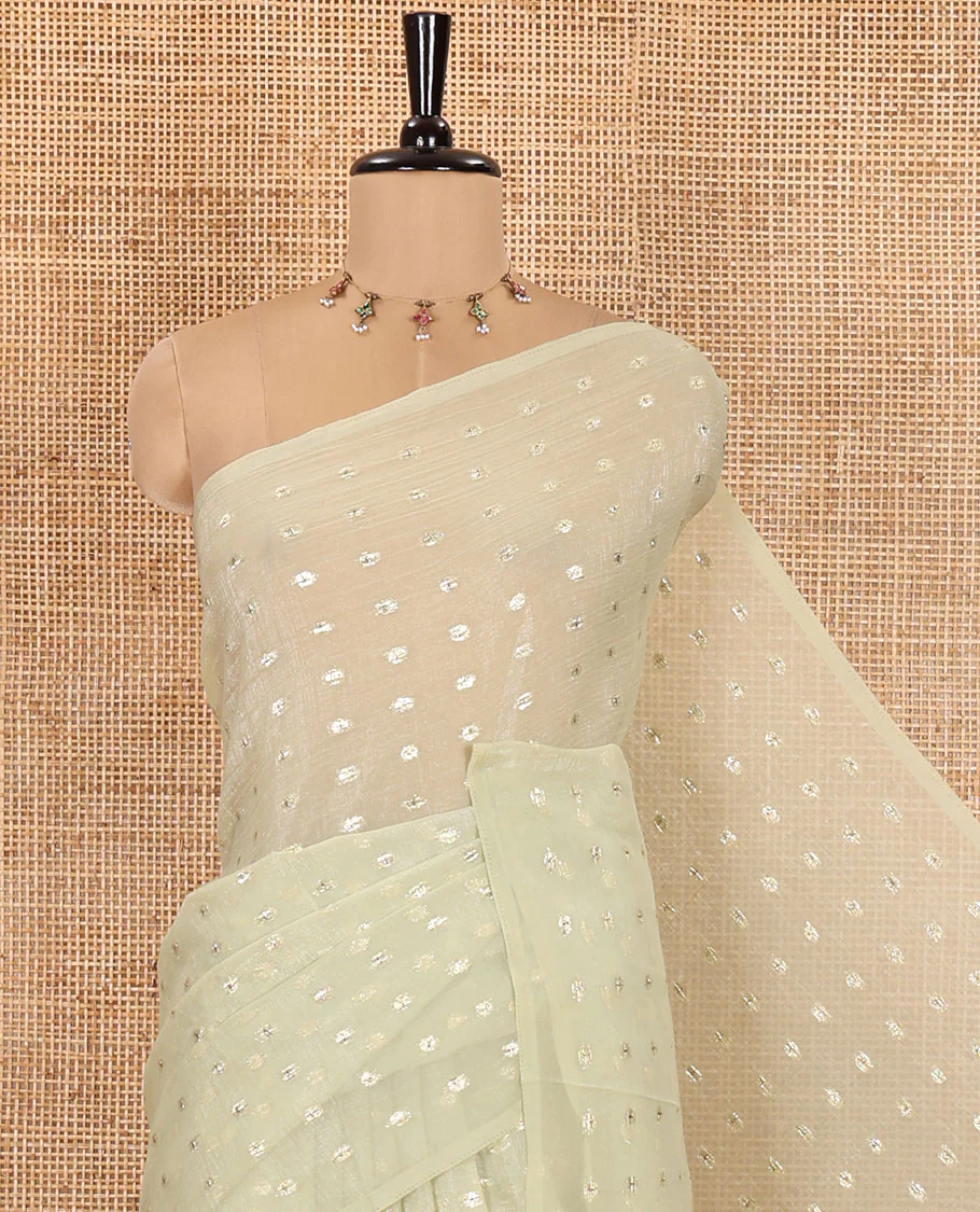 Borderless Pale Green Shimmer Saree, Detailed with Zari Buttas All Over Its Body, Pallu Mirrors the Same Buttas, and Comes Without a Blouse - Image 2